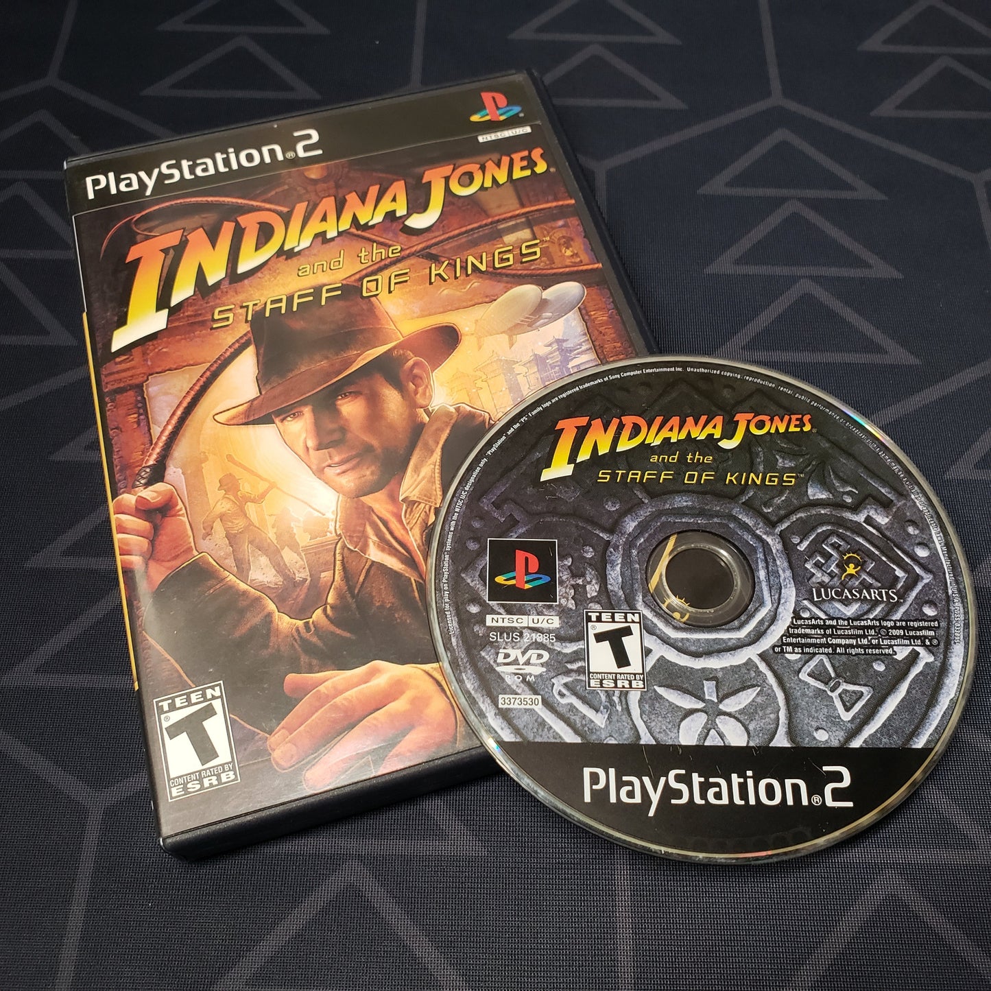 Image shows the case & disc for the video game Indiana Jones and the Staff of Kings for Playstation 2
