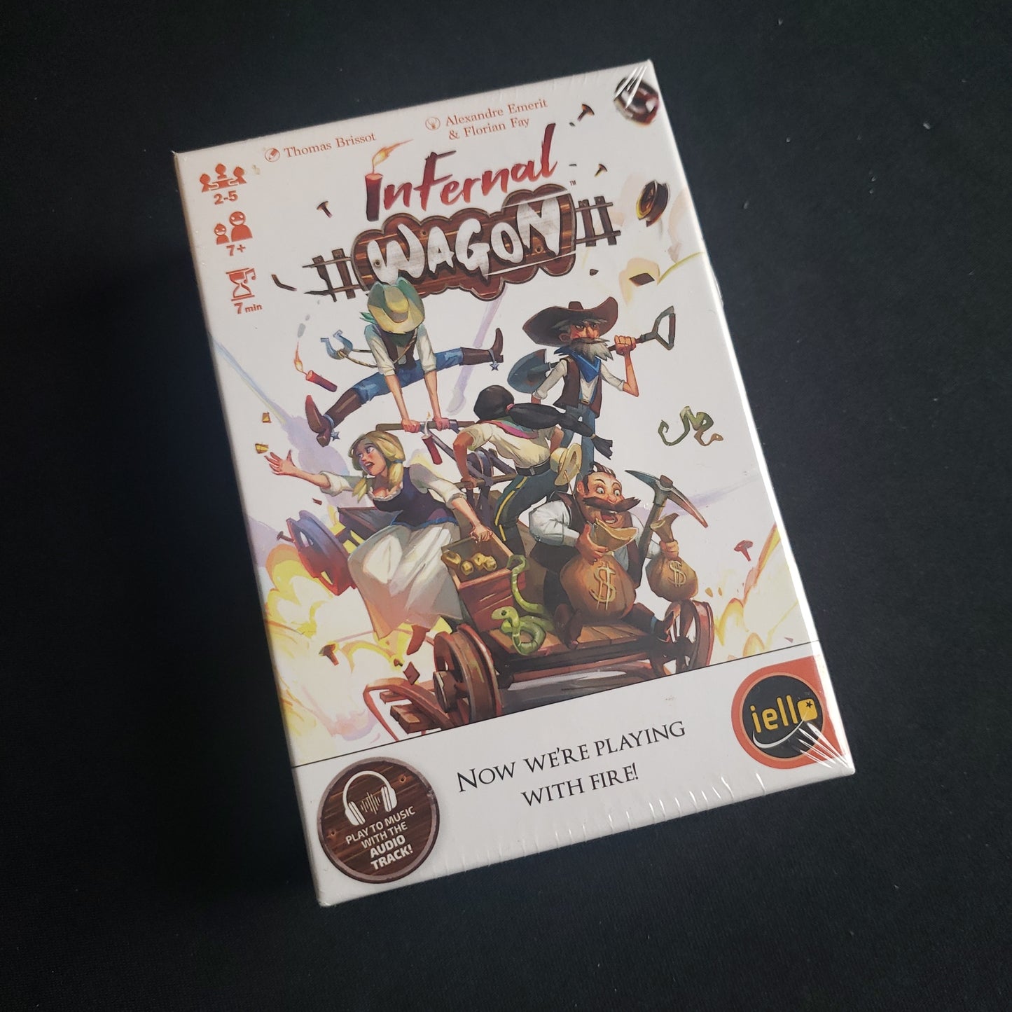 Image shows the front cover of the box of the Infernal Wagon card game