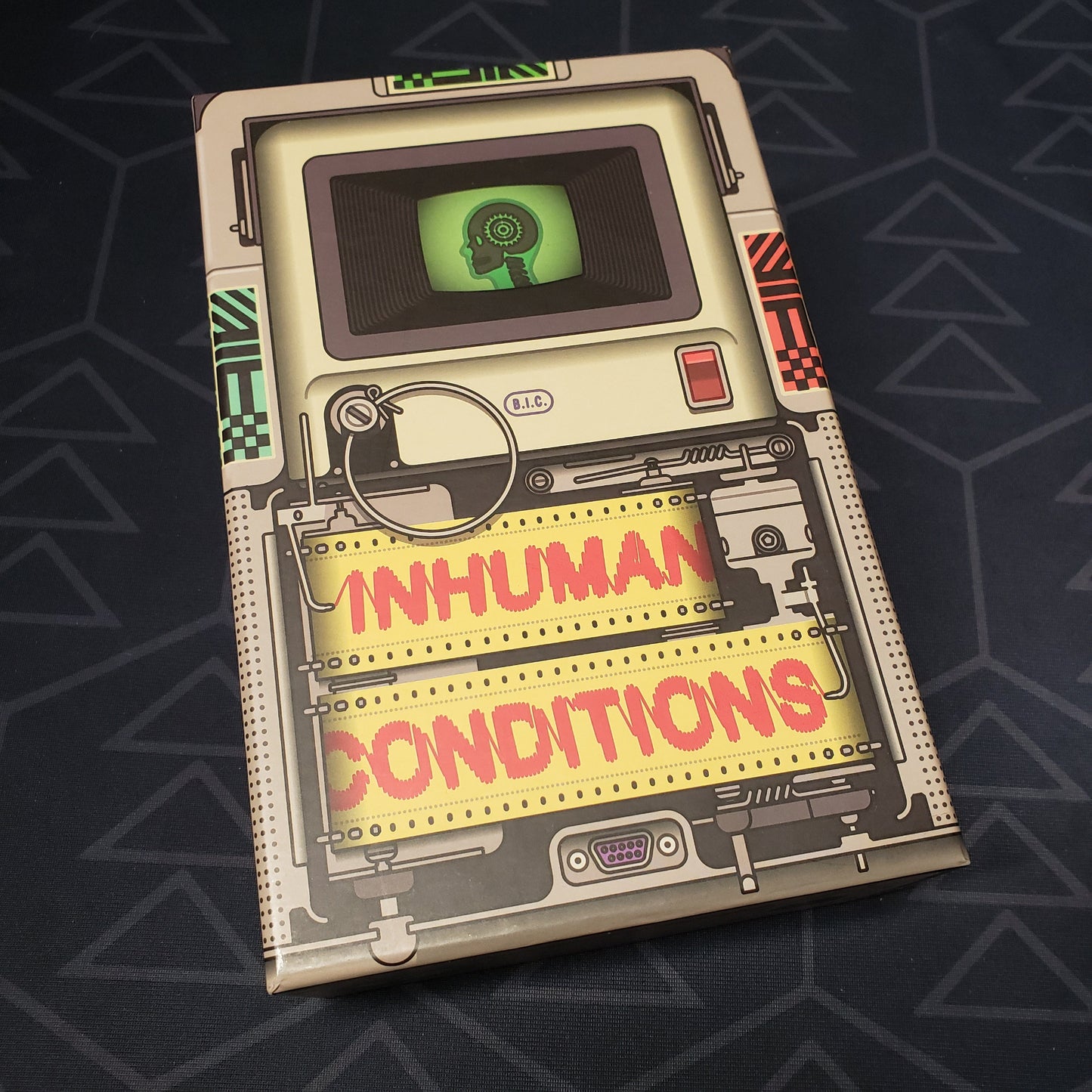 Image shows the front cover of the box for the Inhuman Conditions (Second Edition) board game