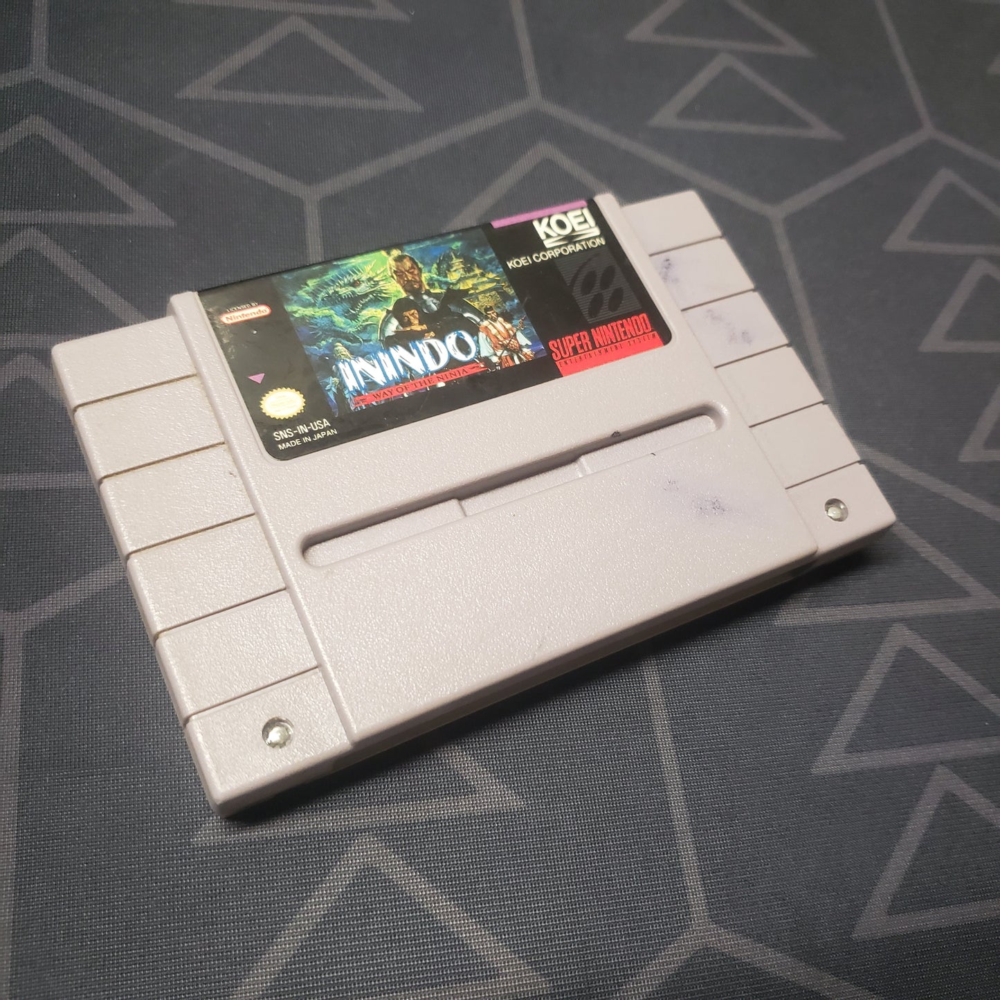 Image shows the front of the cartridge for the video game Inindo: Way of the Ninja for the Super Nintendo