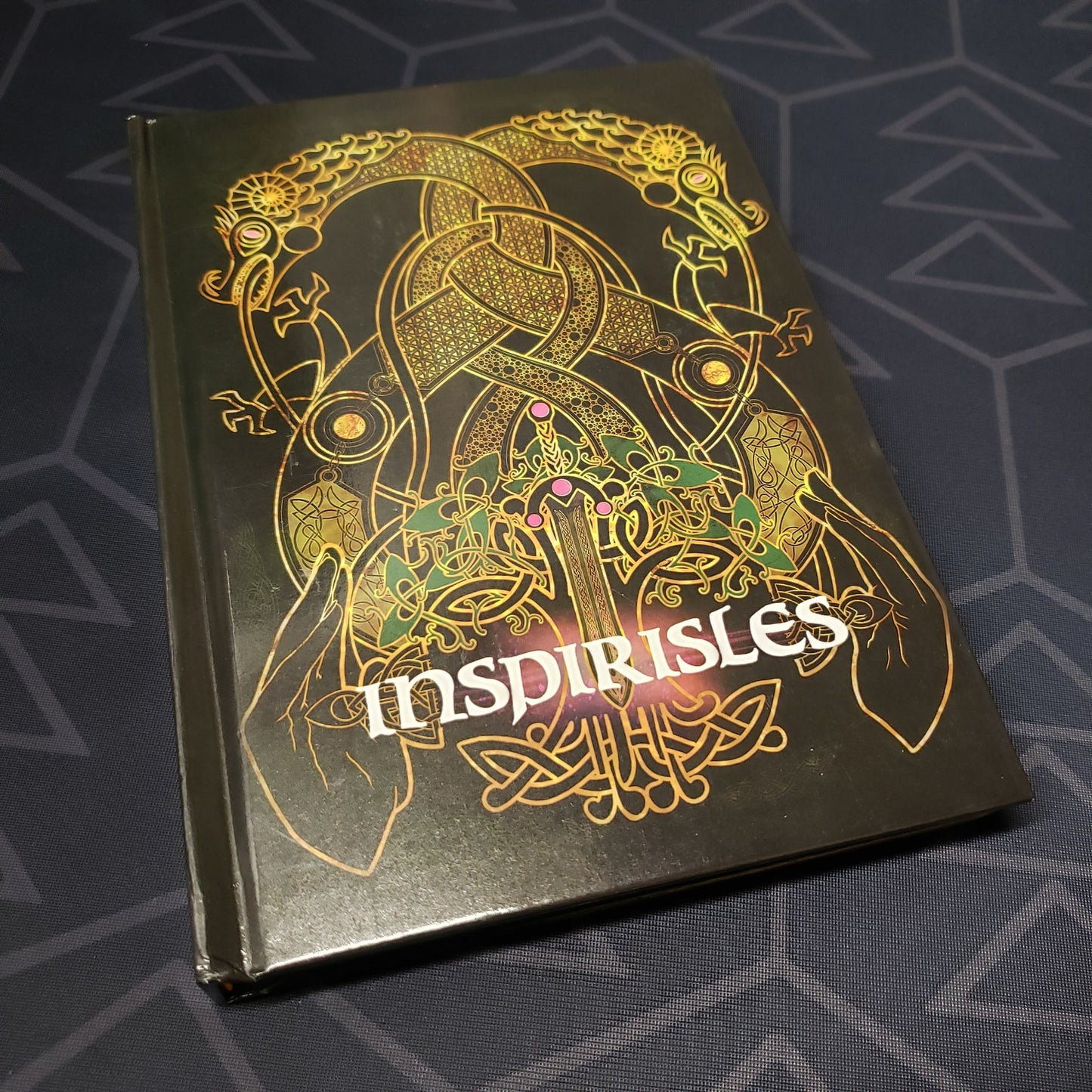Image shows the front cover of the Inspirisles roleplaying game book