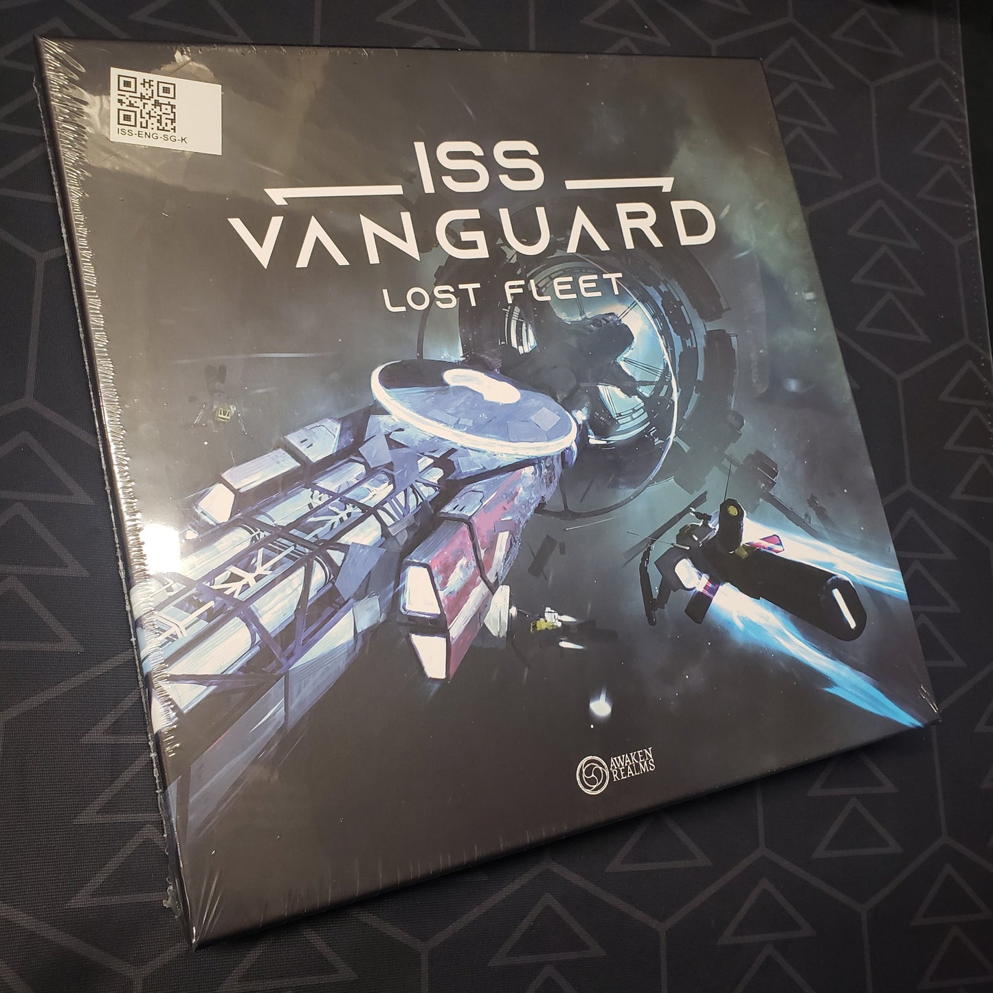 Image shows the front cover of the box of the Lost Fleet expansion for the board game ISS Vanguard
