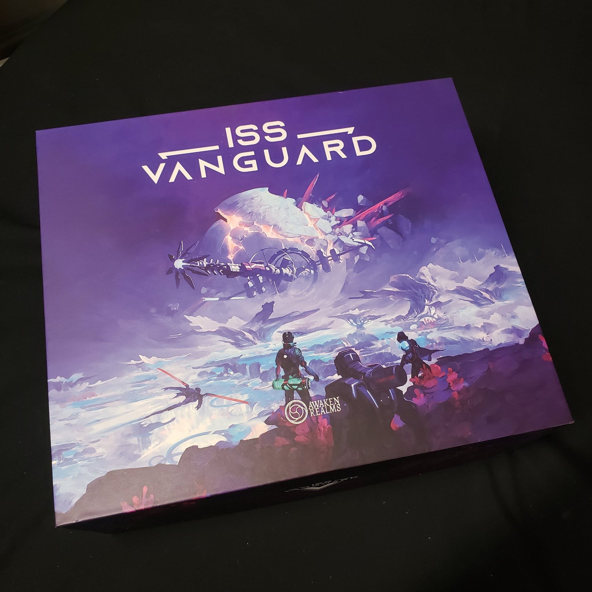 Image shows the front cover of the box of the ISS Vanguard board game