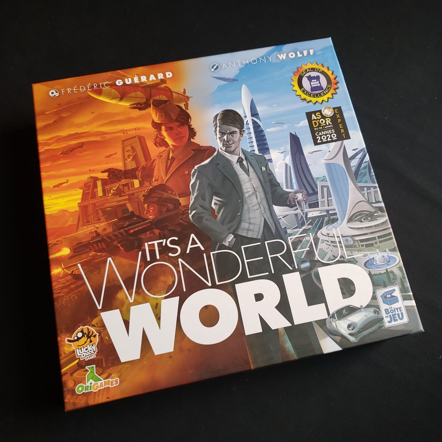 Image shows the front cover of the box of the It's A Wonderful World board game