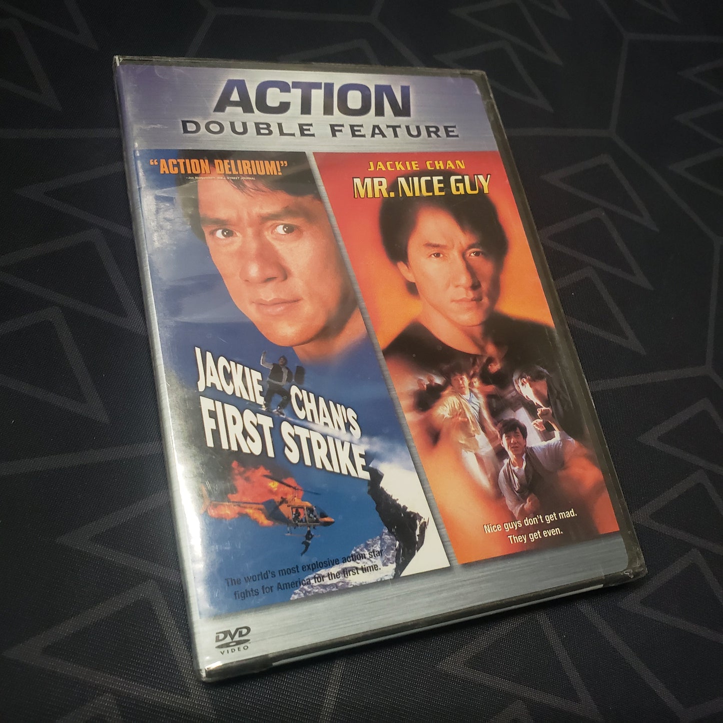Image shows the front of the case for the two-movie pack of Jackie Chan's First Strike + Mr. Nice Guy on DVD