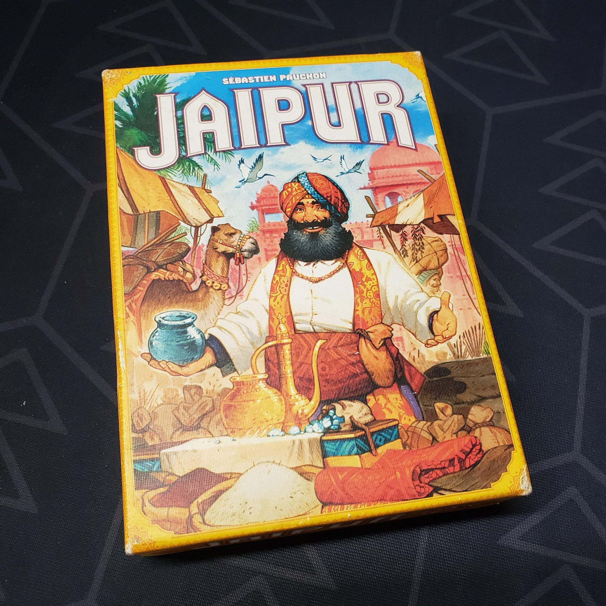 Image shows the front cover of the box for the Jaipur card game