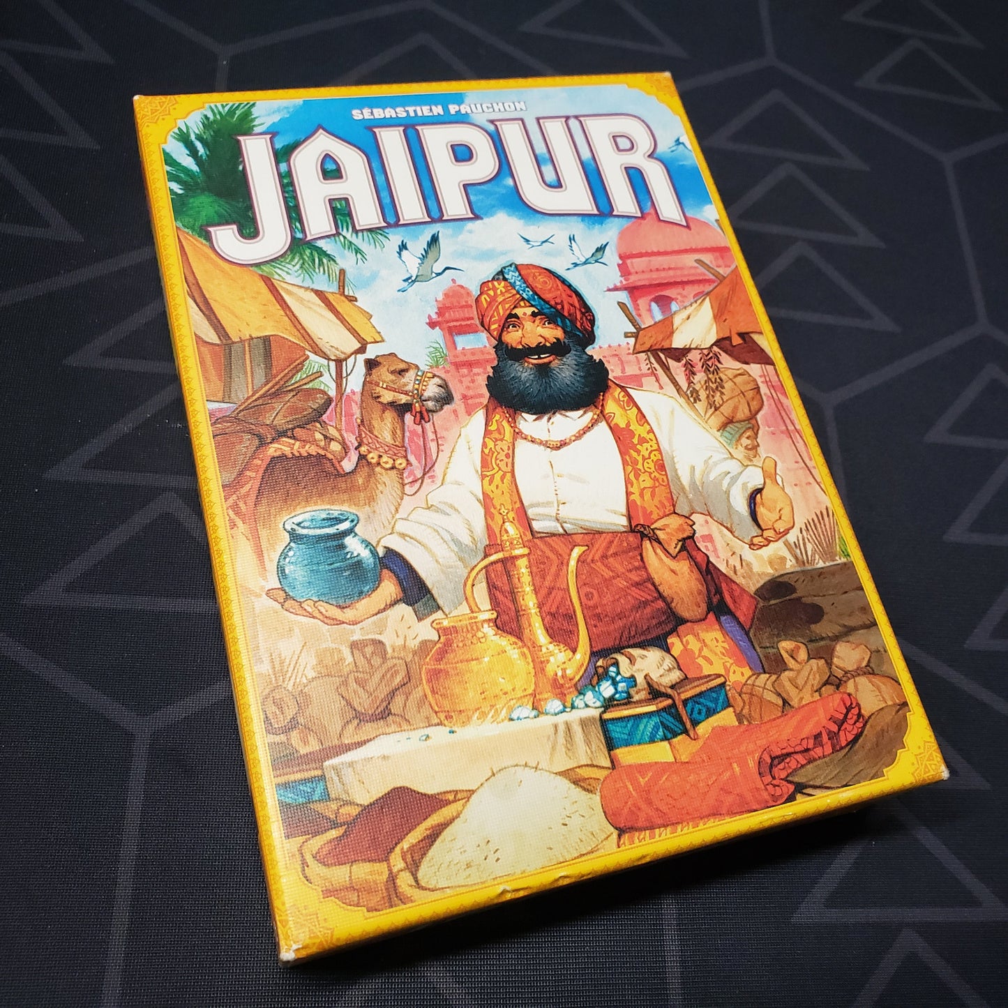 Image shows the front cover of the box for the Jaipur card game