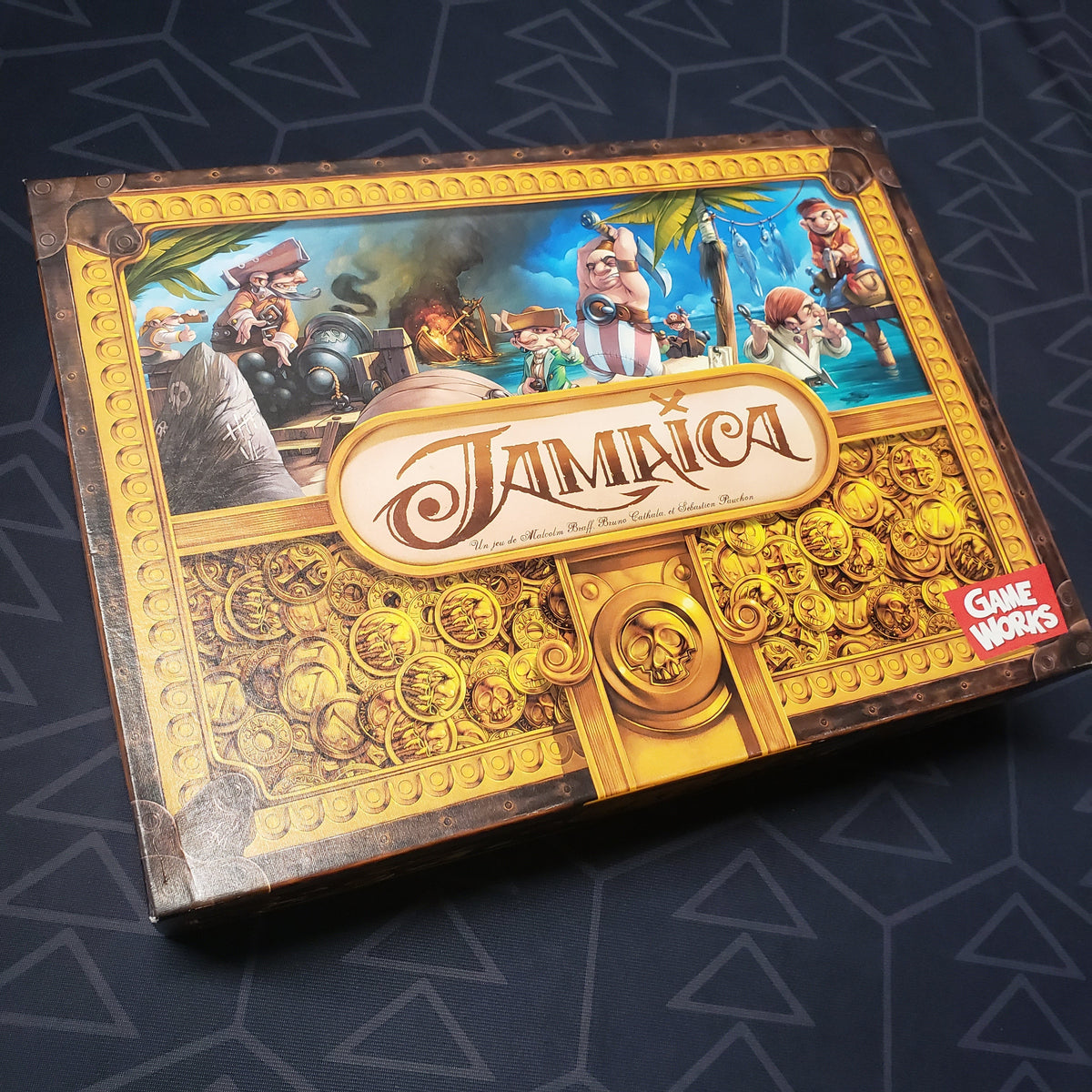 Image shows the front cover of the box of the Jamaica board game