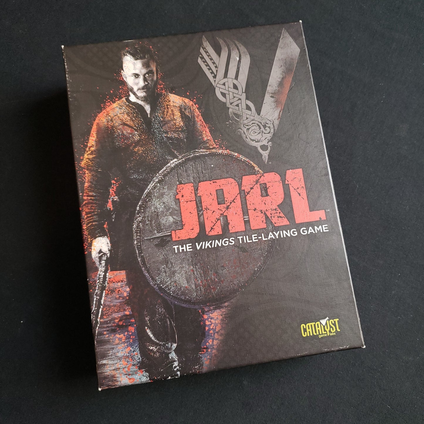 Image shows the front cover of the box of the Jarl board game
