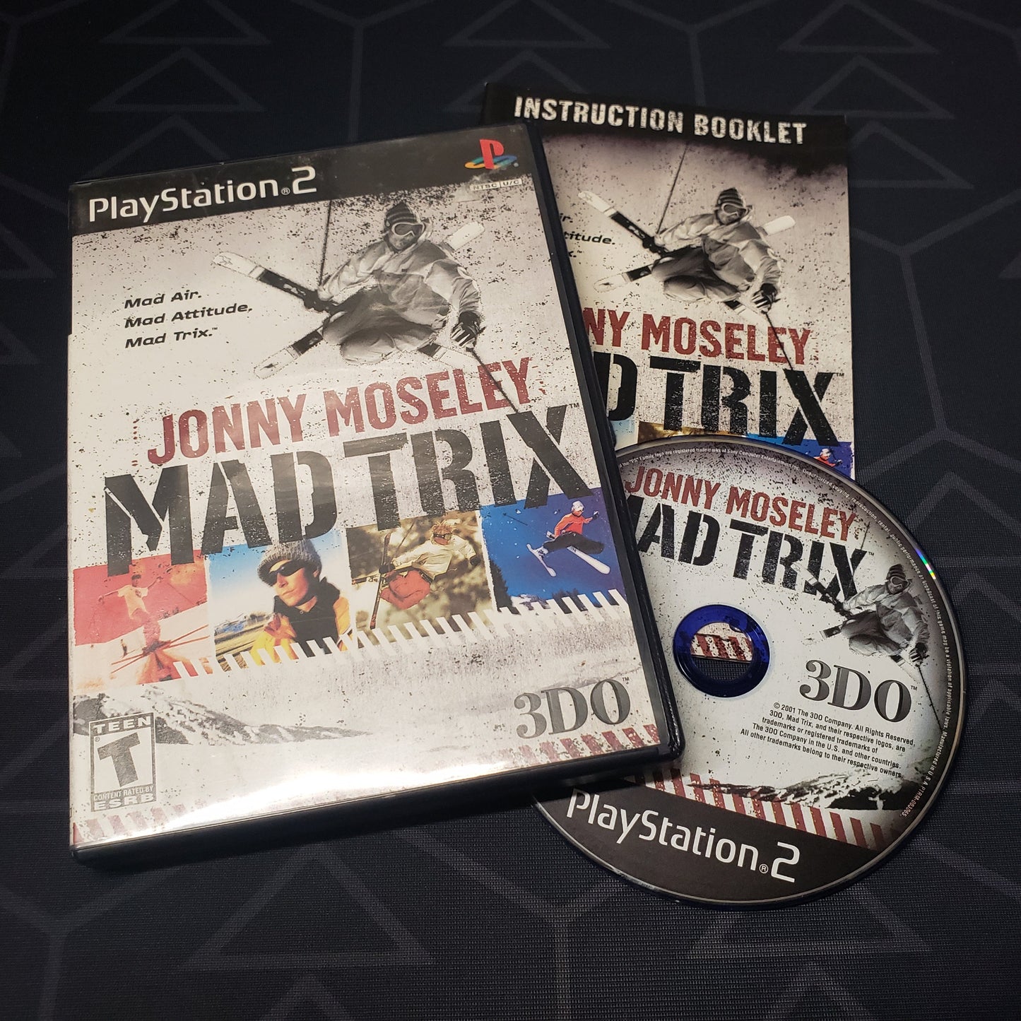 Image shows the case, manual and disc for the video game Jonny Moseley Mad Trix for Playstation 2