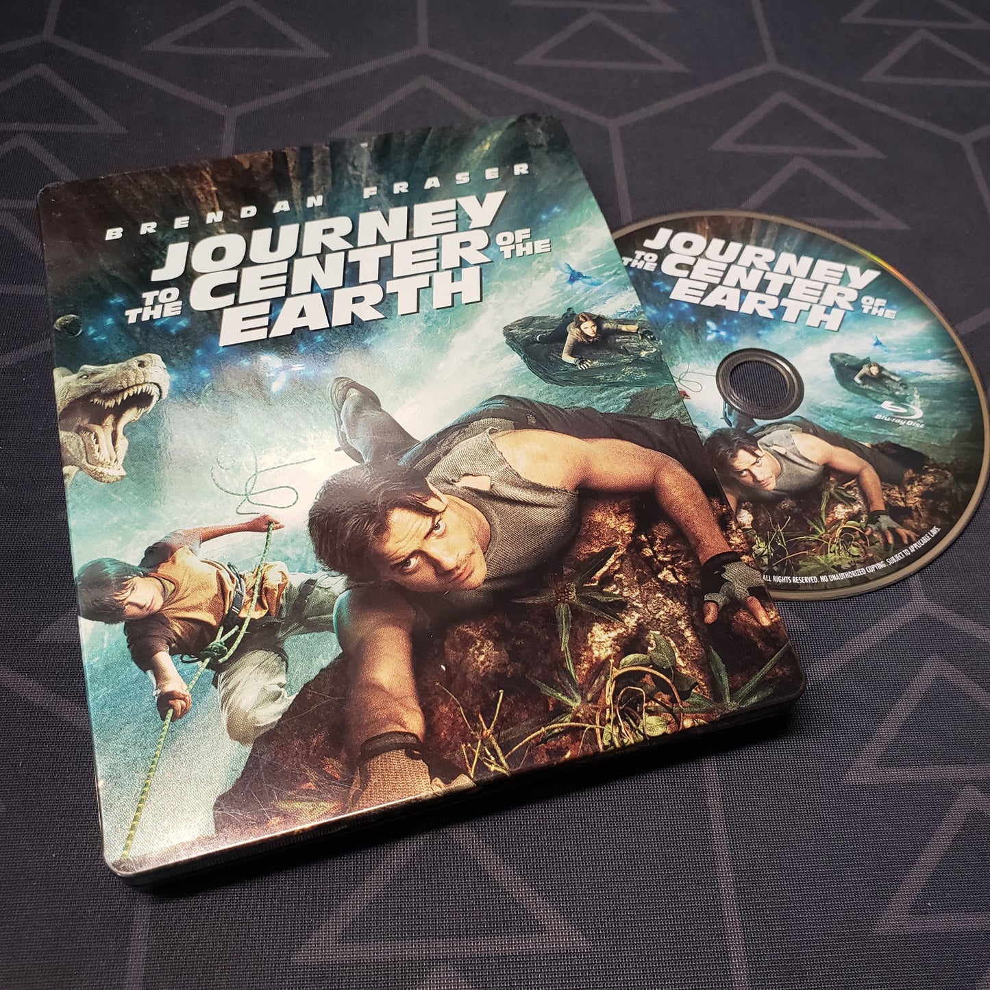 Image shows the steelbook case & disc for the movie Journey to the Center of the Earth on Blu-Ray