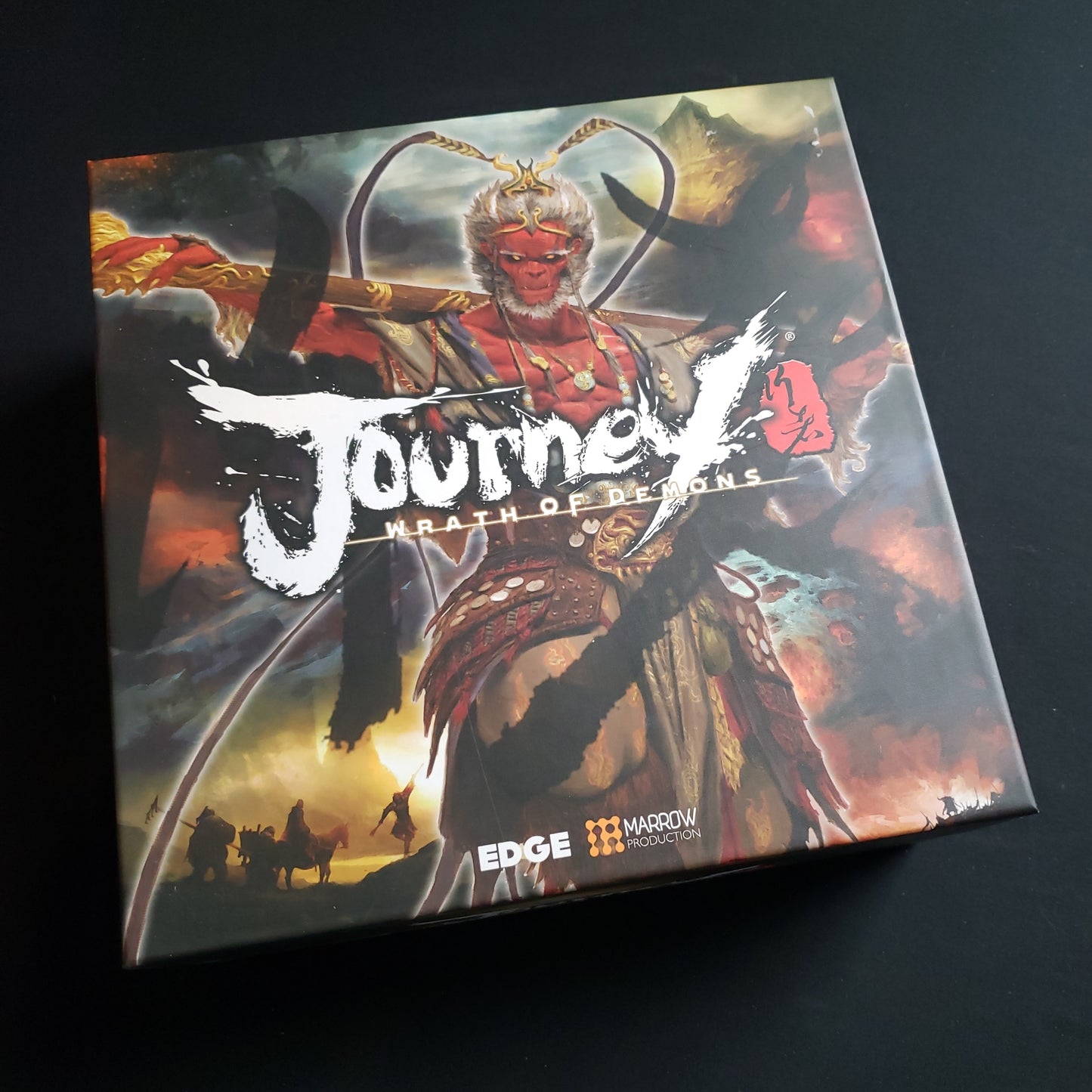 Image shows the front cover of the box of the Journey: Wrath of Demons board game