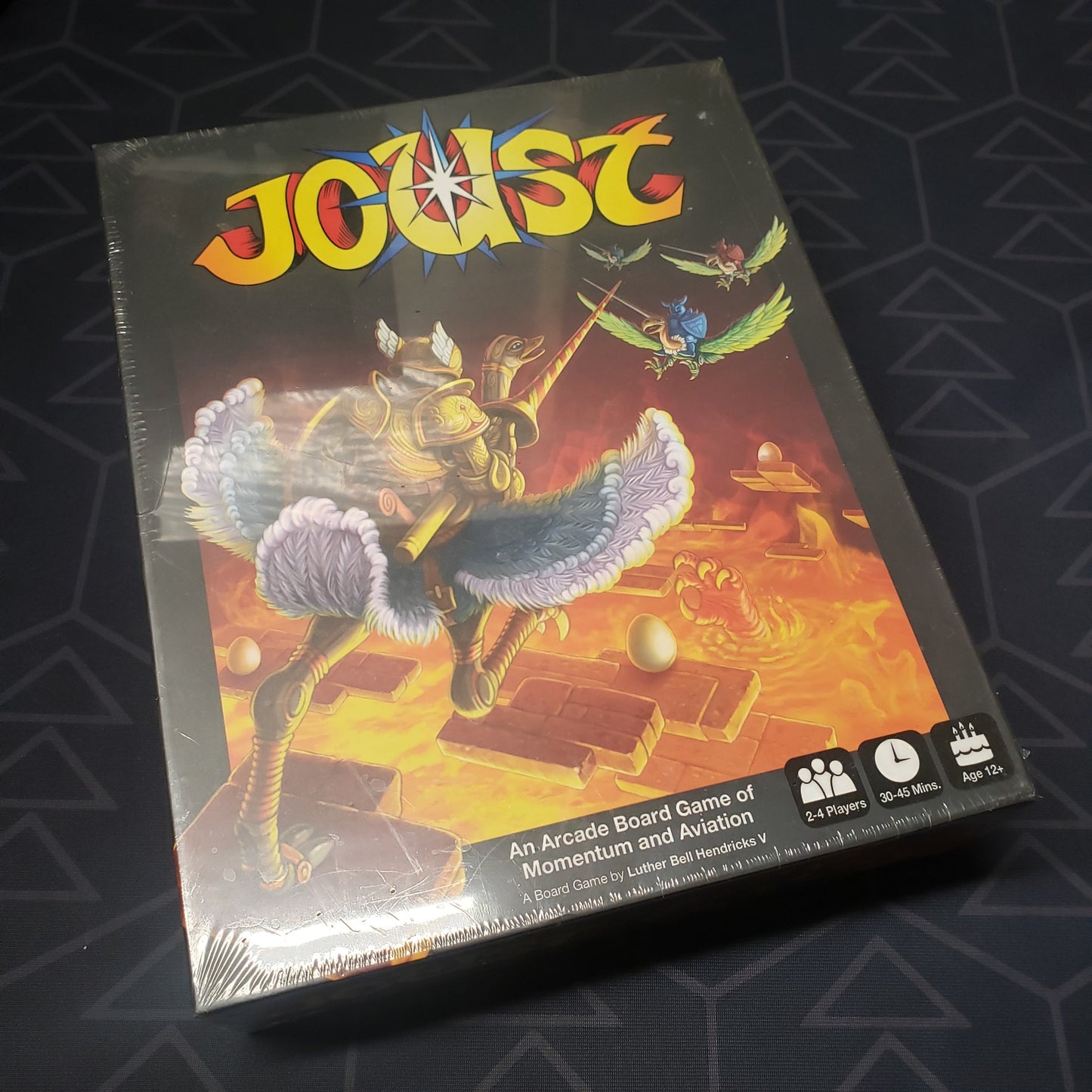 Image shows the front cover of the box for the Joust board game