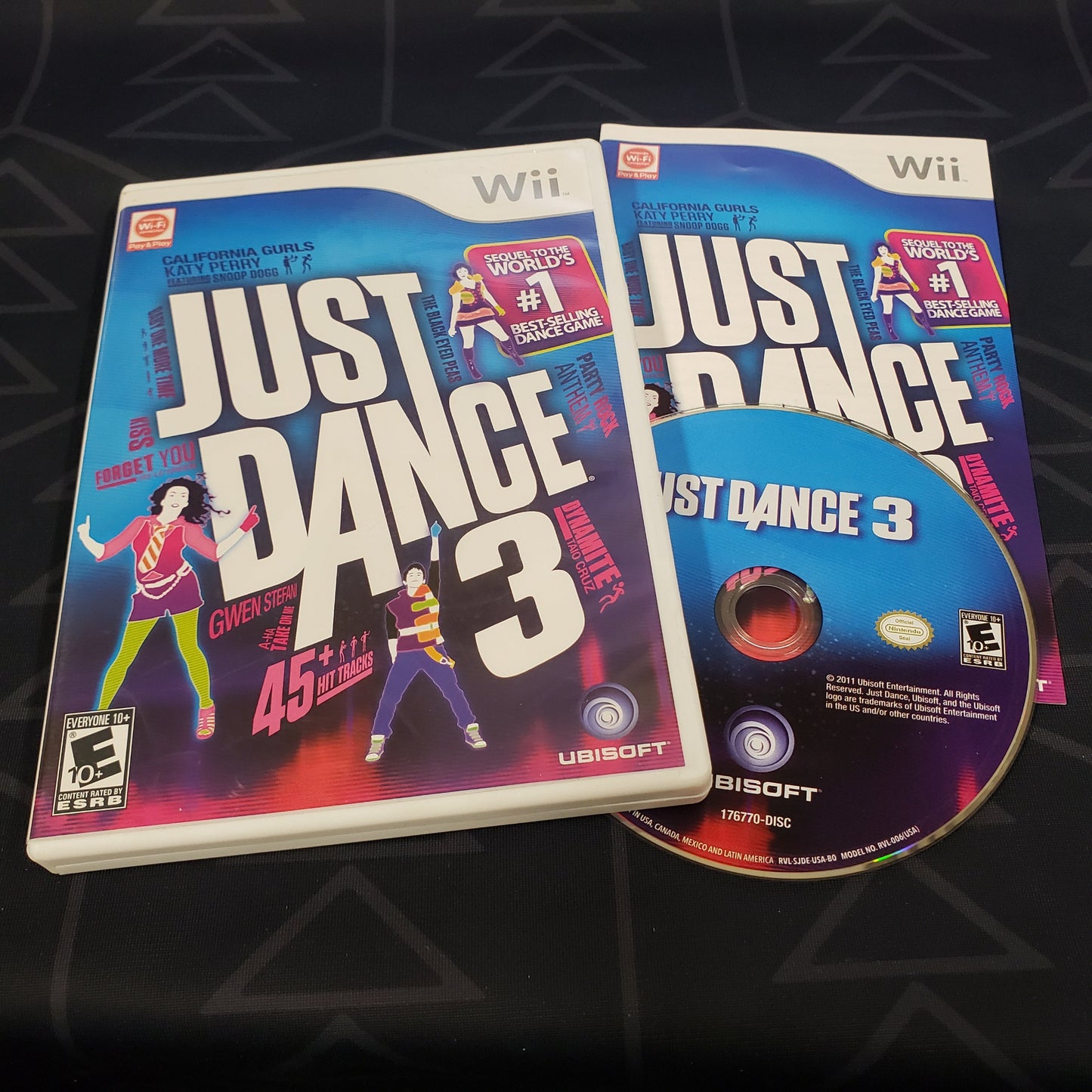 Image shows the case, manual and disc for the video game Just Dance 3 for Nintendo Wii
