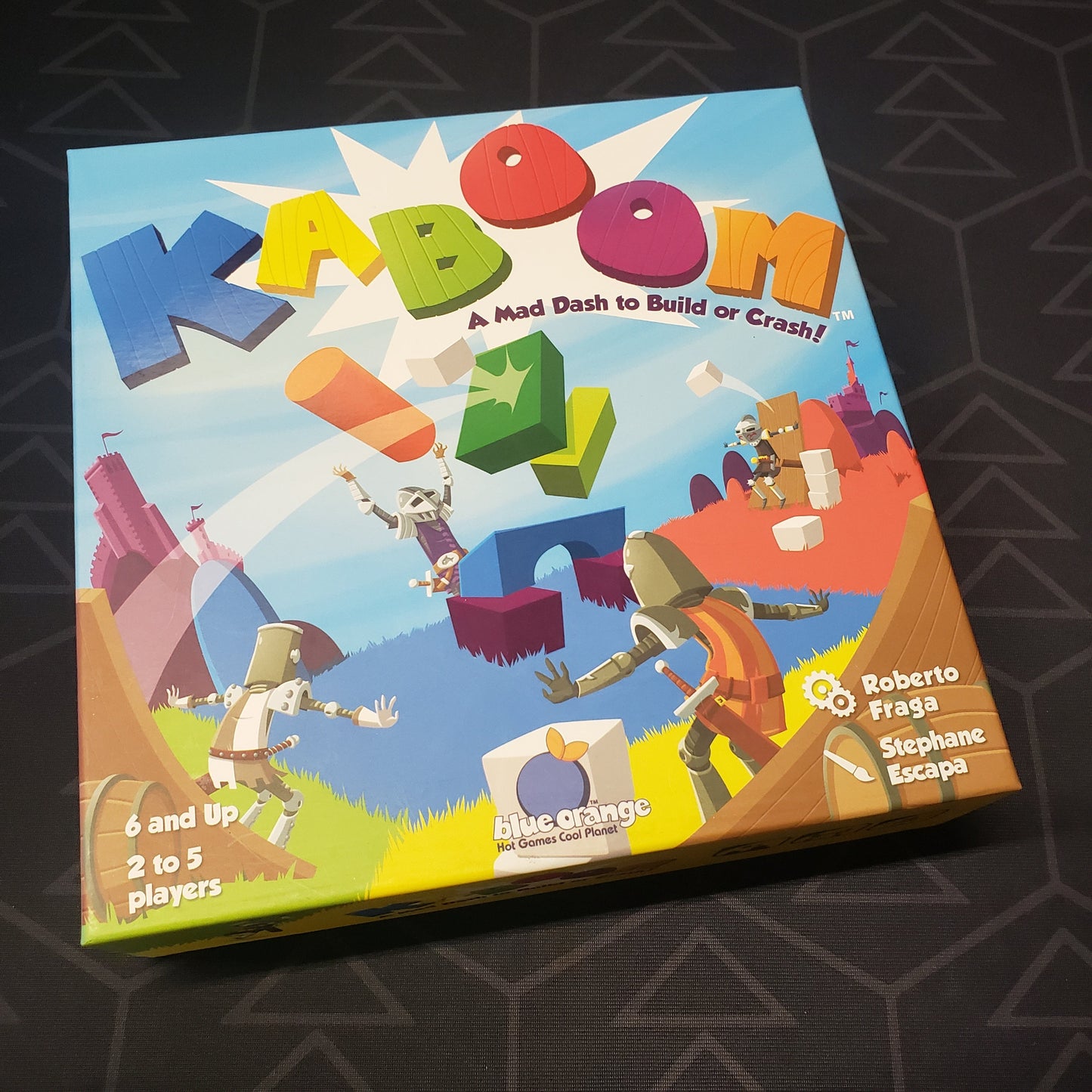 Image shows the front cover of the box for the Ka-Boom board game