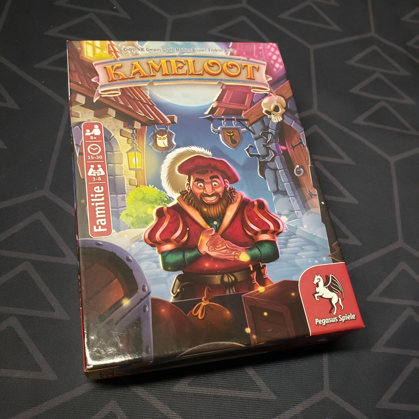 Image shows the front cover of the box for the Kameloot card game