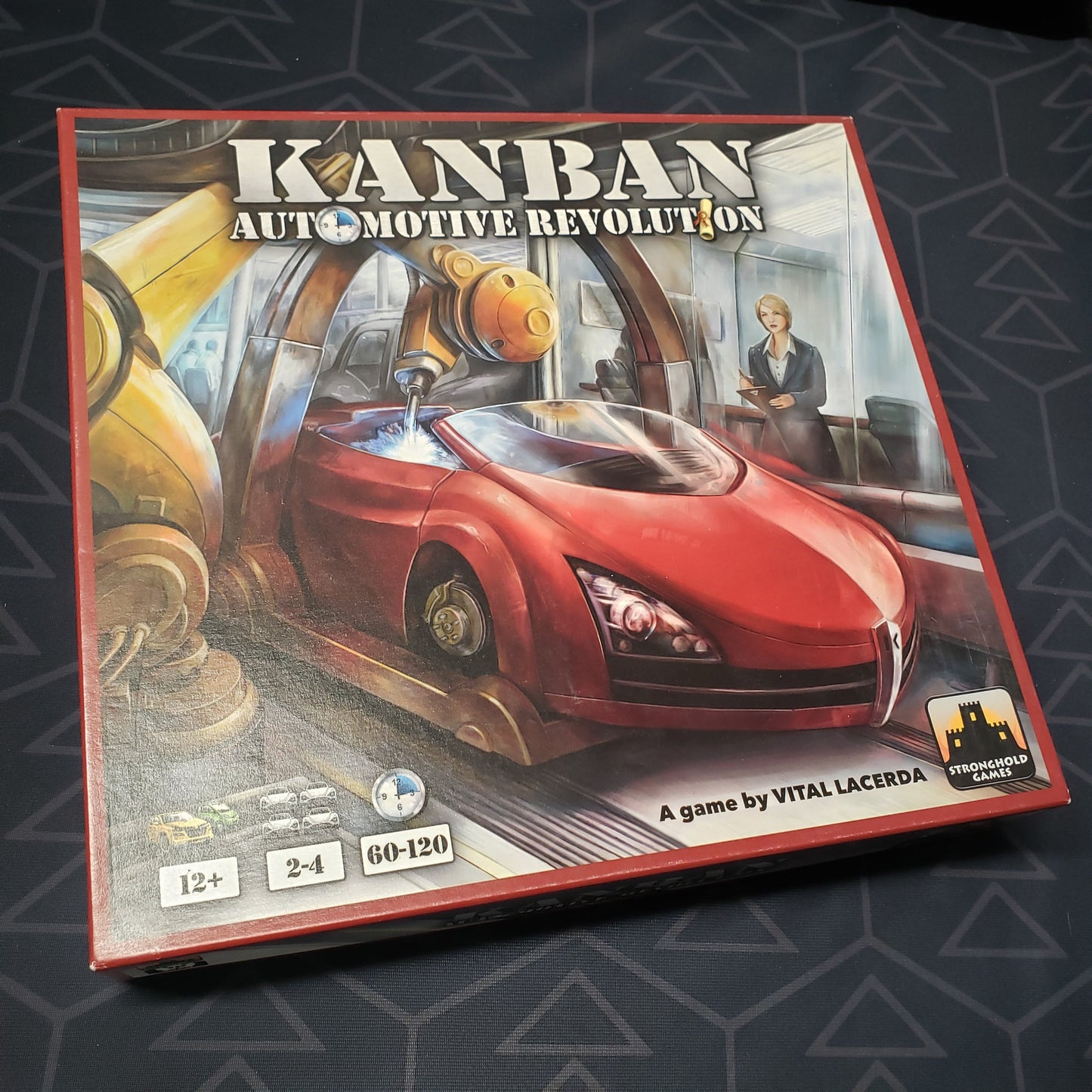 Image shows the front cover of the box for the Kanban: Automotive Revolution board game
