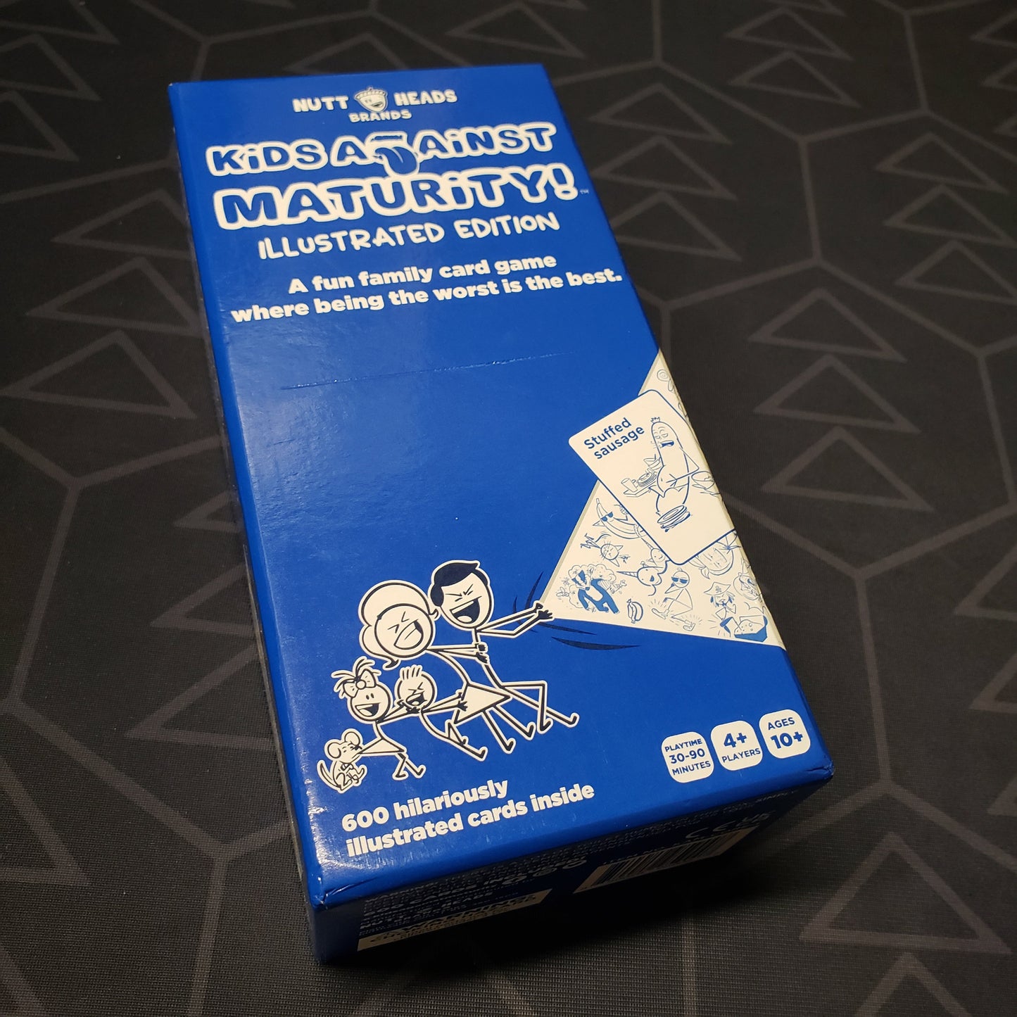 Image shows the front cover of the box for the Kids Against Maturity card game