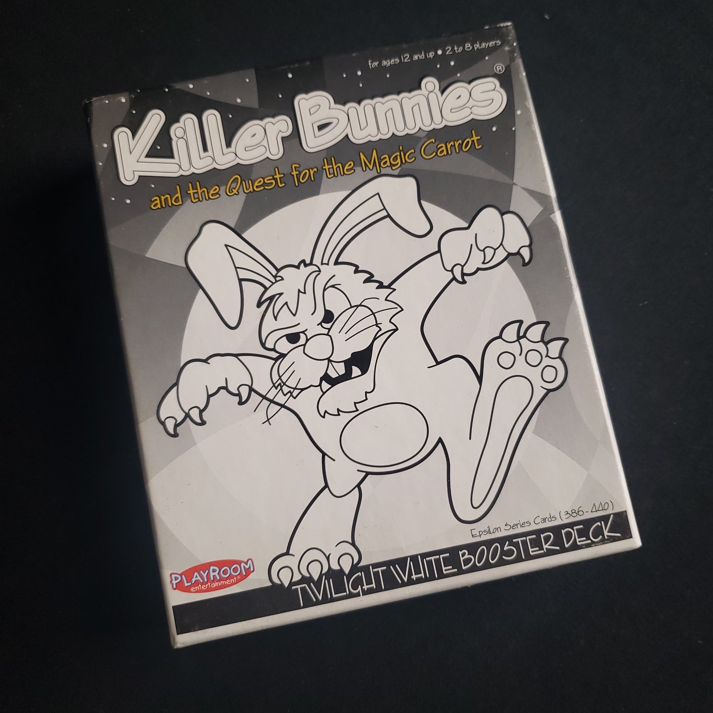 Image shows the front cover of the box of the Twilight White Booster Deck for the card game Killer Bunnies