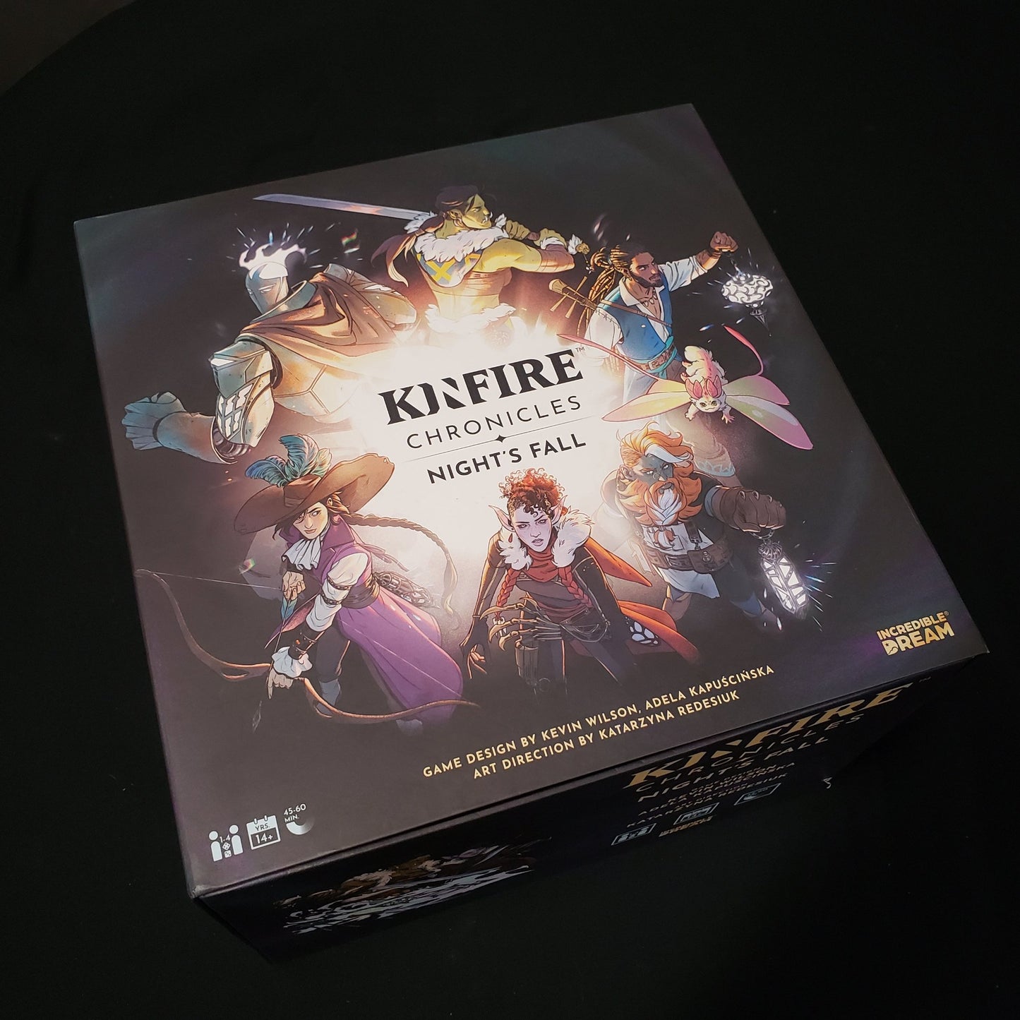 Image shows the front cover of the box of the board game Kinfire Chronicles: Night's Fall