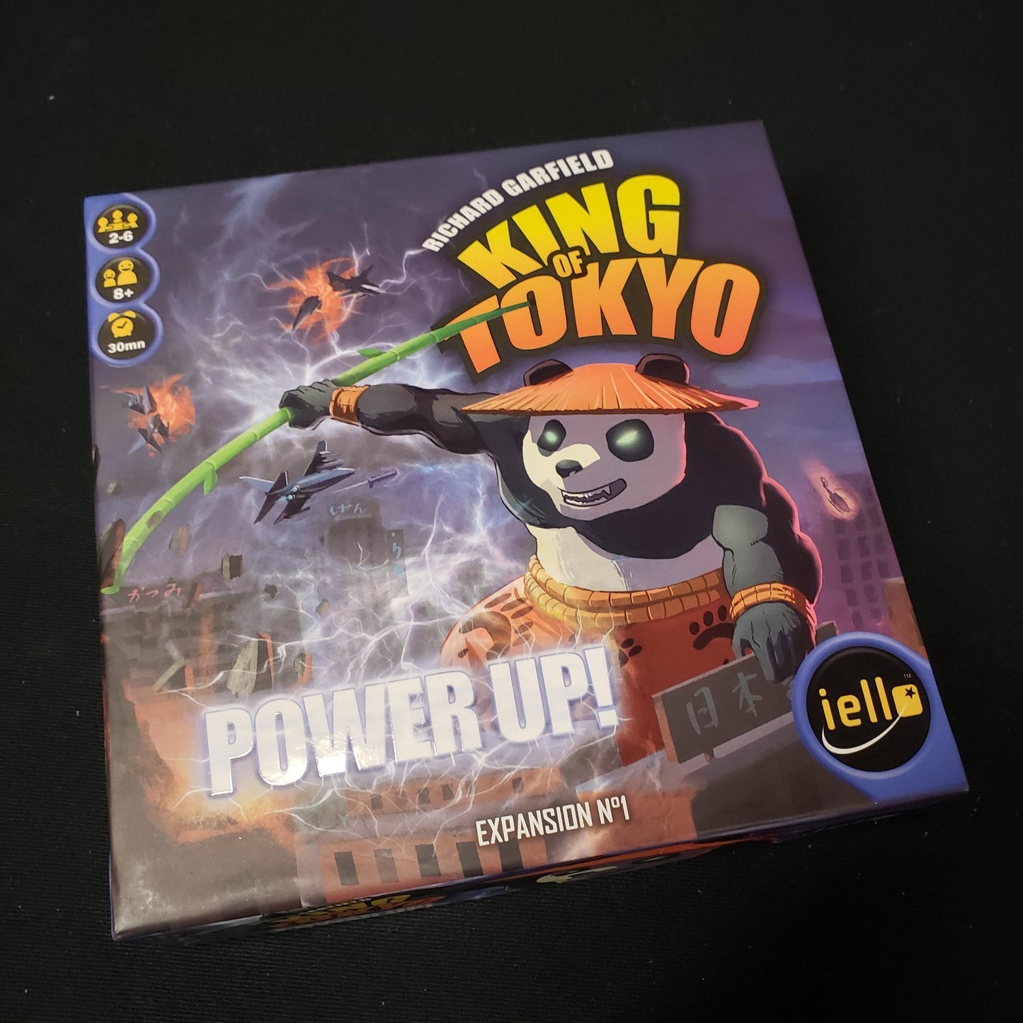 Image shows the front cover of the box of the Power Up! expansion for the board game King of Tokyo