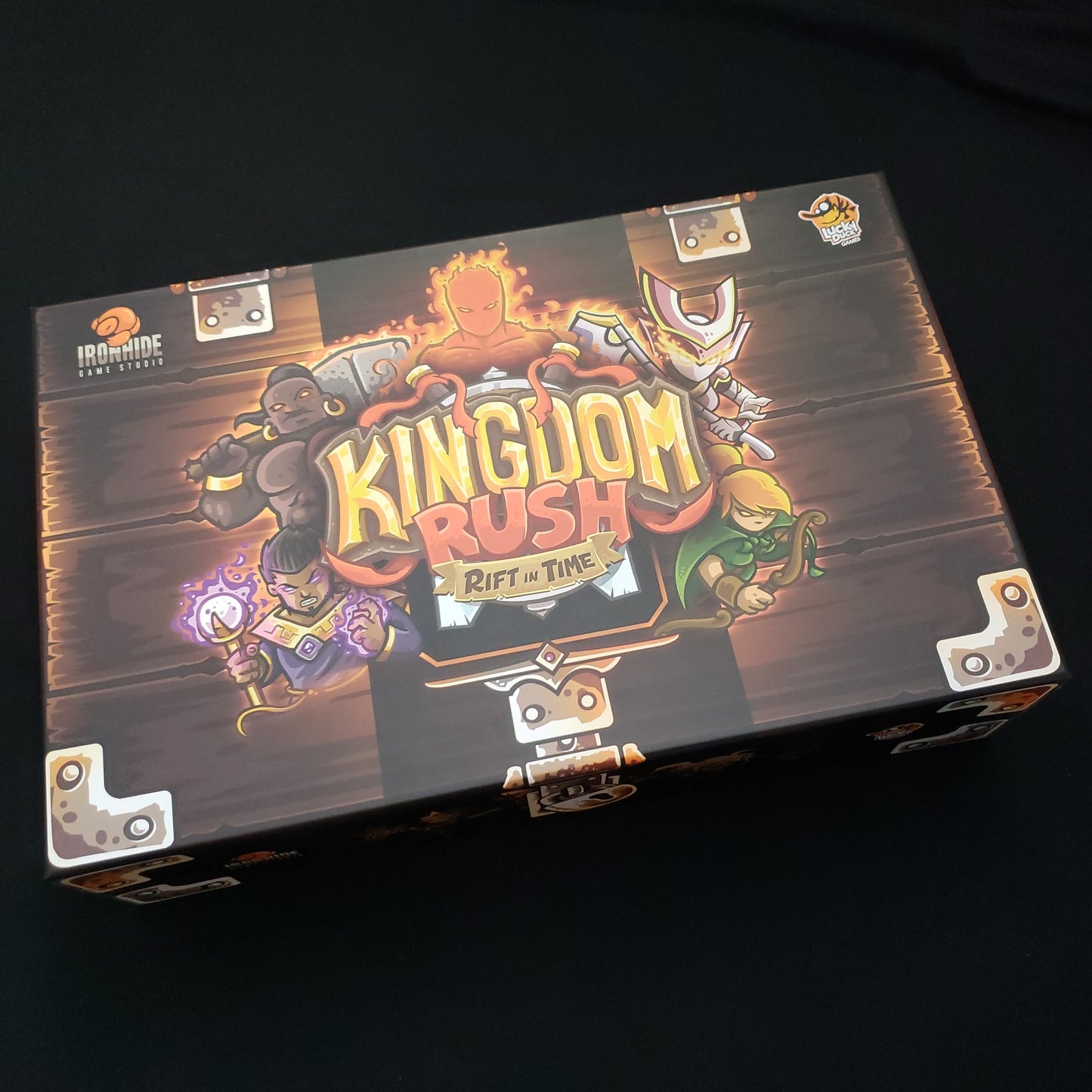 Image shows the front cover of the deluxe storage box for the board game Kingdom Rush: Rift in Time