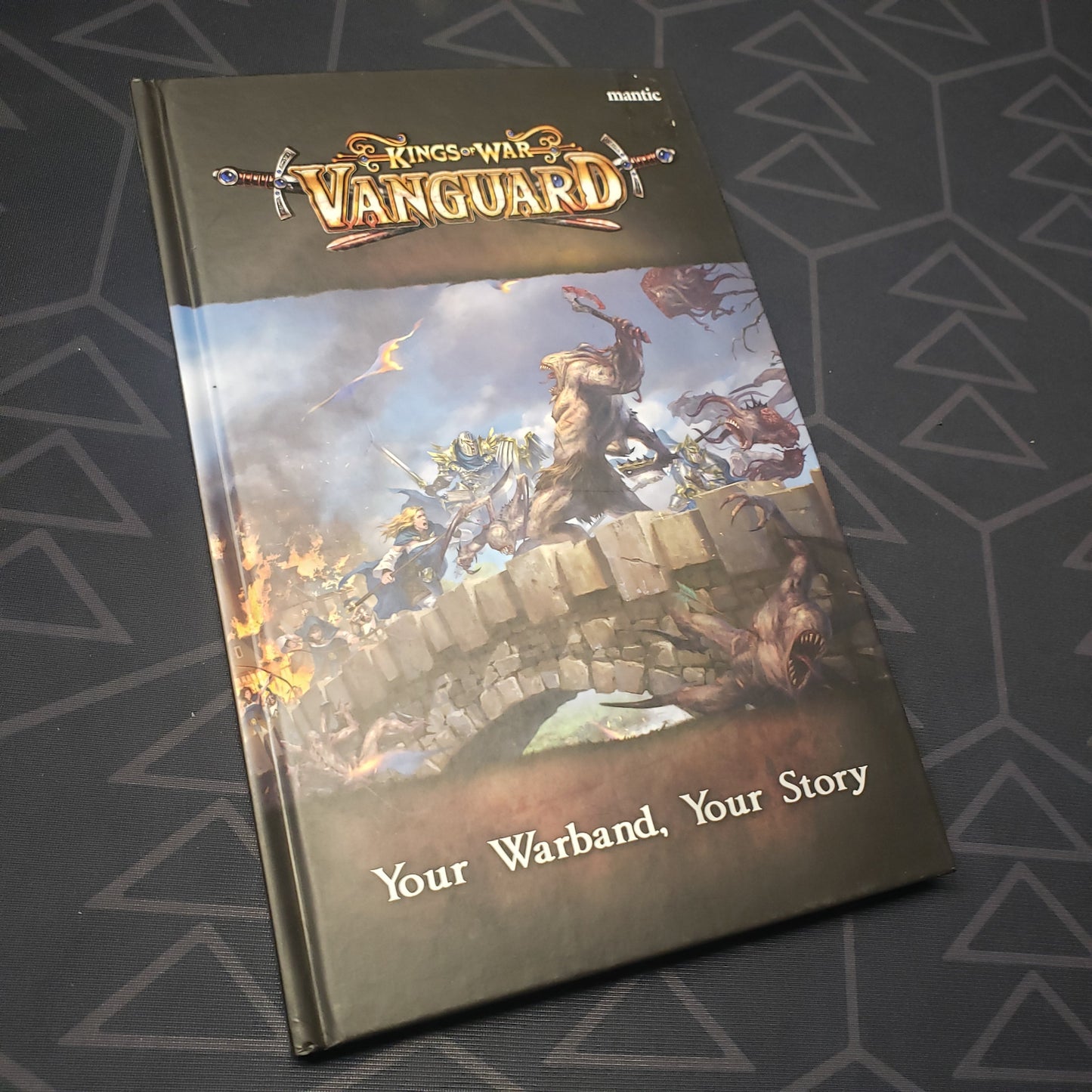 Image shows the front cover of the Kings of War: Vanguard wargaming book