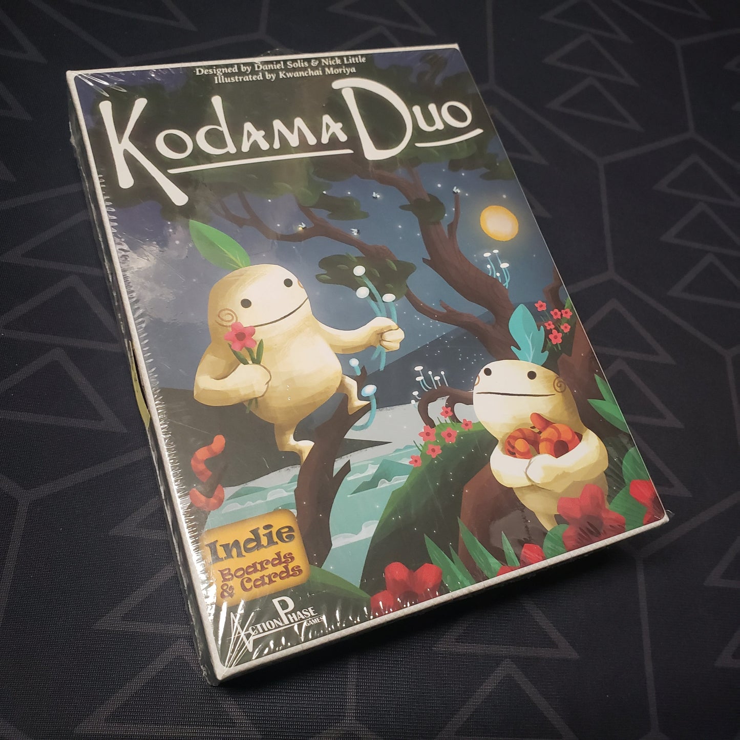 Image shows the front cover of the box for the Kodama Duo card game