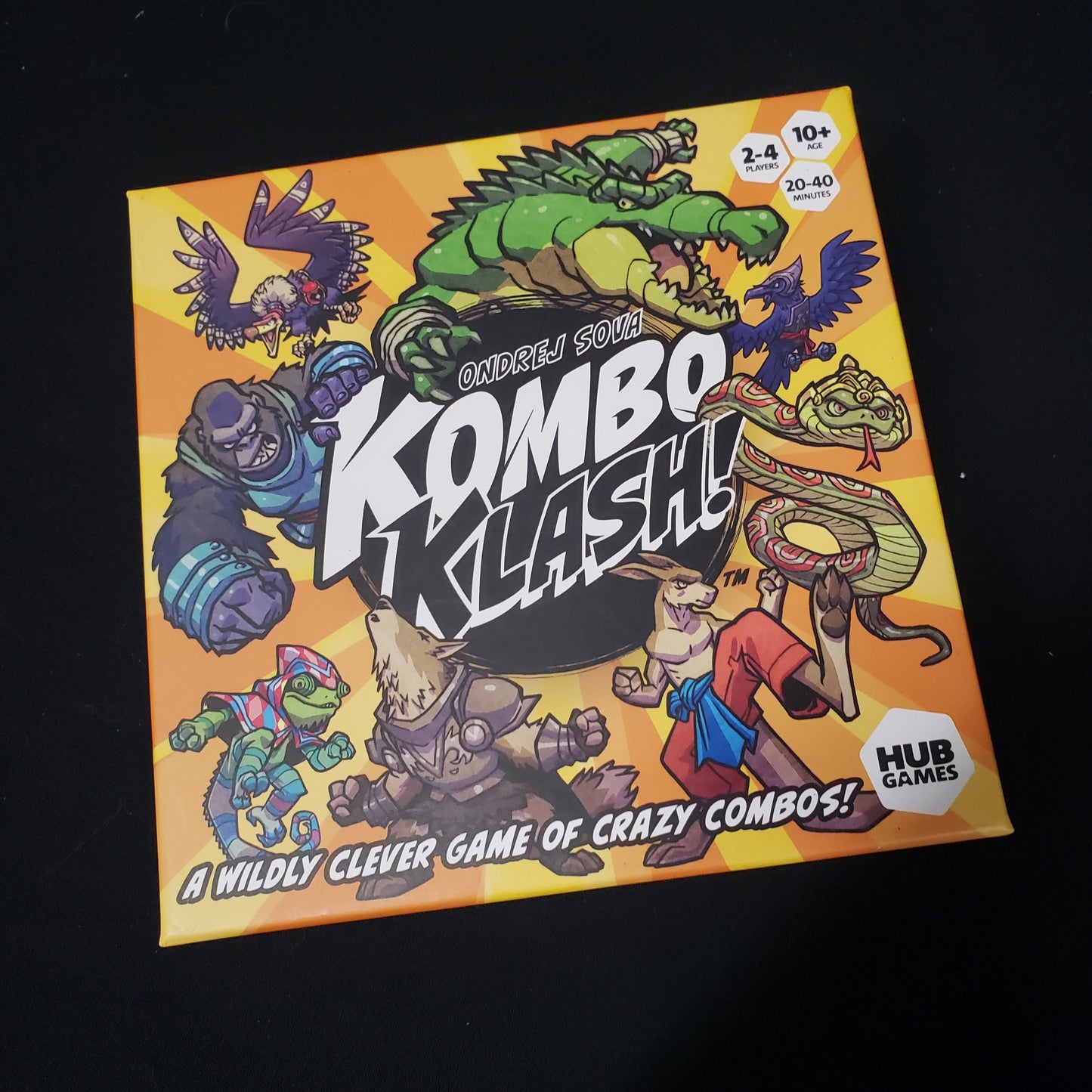Image shows the front cover of the box of the Kombo Klash board game