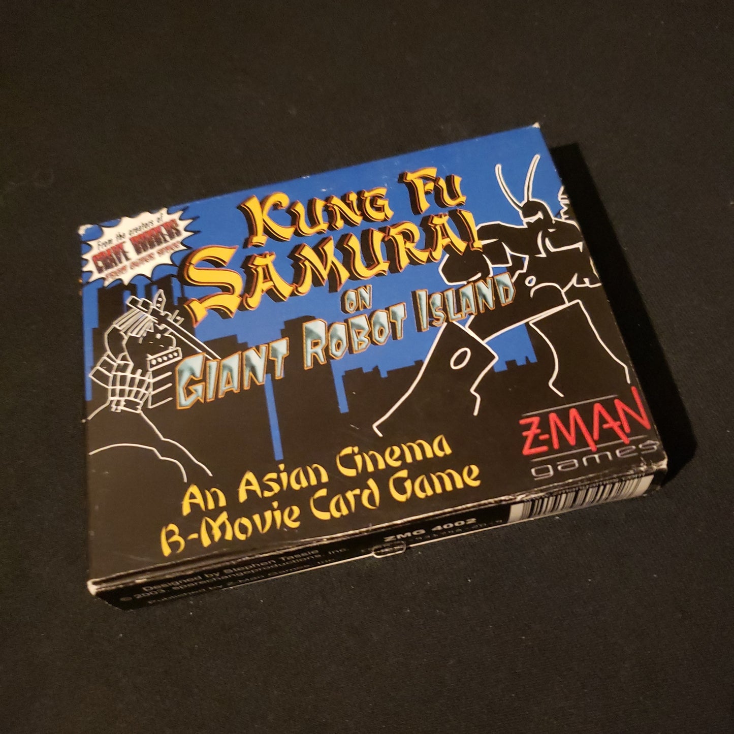 Image shows the front cover of the box of the Kung Fu Samurai on Giant Robot Island card game