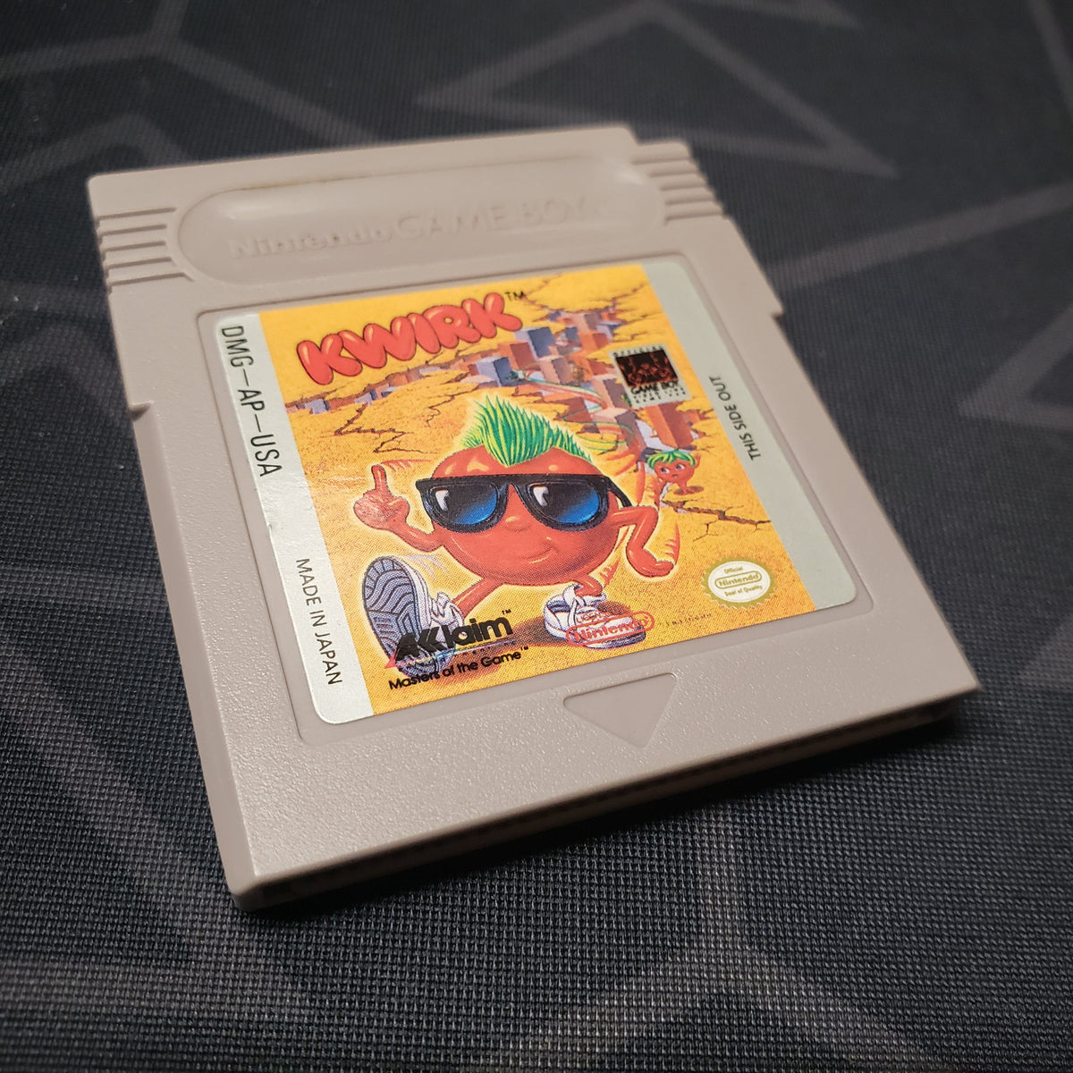 Image shows the front of the cartridge for the video game Kwirk for Nintendo Game Boy