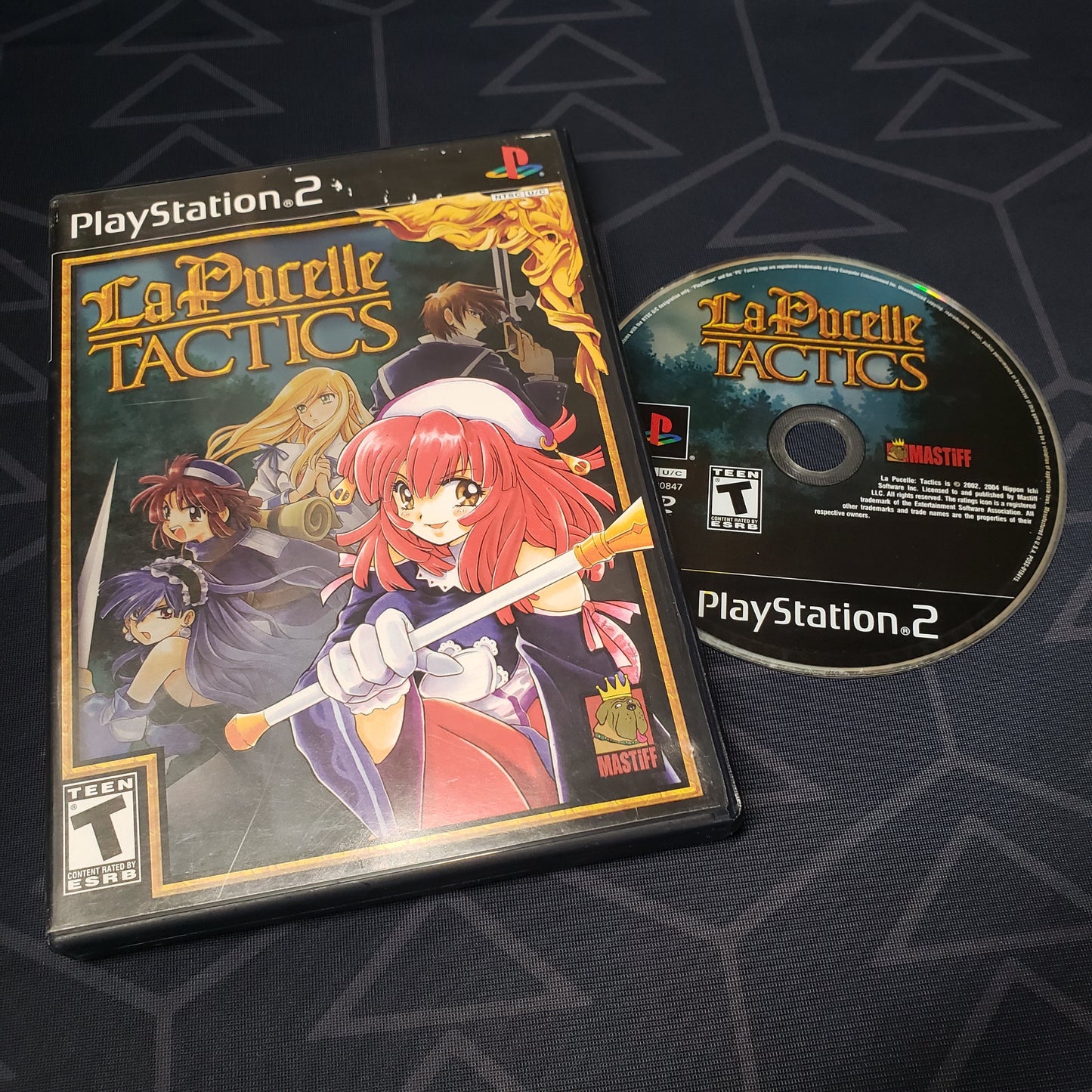 Image shows the case & disc for the video game La Pucelle: Tactics for Playstation 2
