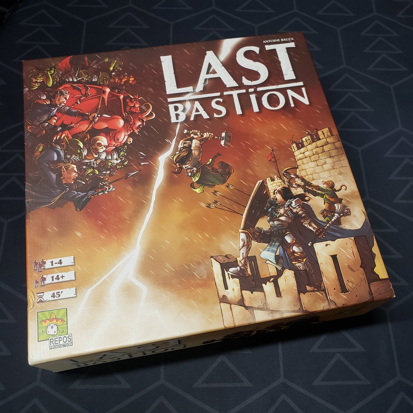 Image shows the front cover of the box of the Last Bastion board game