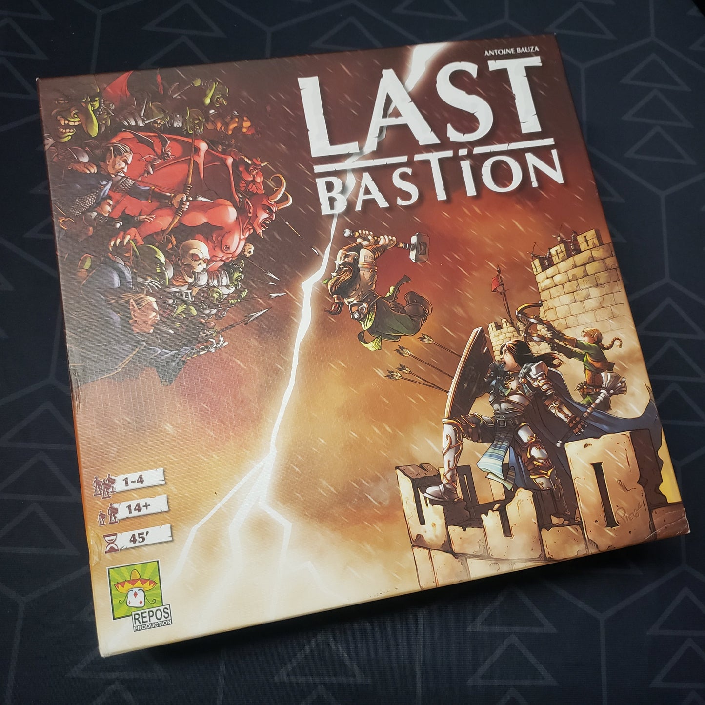 Image shows the front cover of the box of the Last Bastion board game