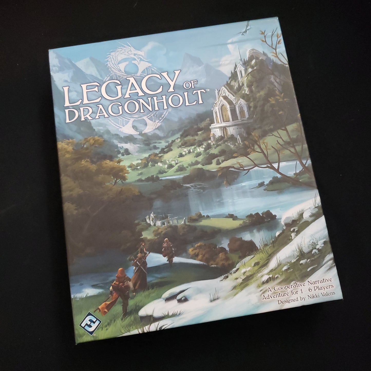 Image shows the front cover of the box of the Legacy of Dragonholt board game