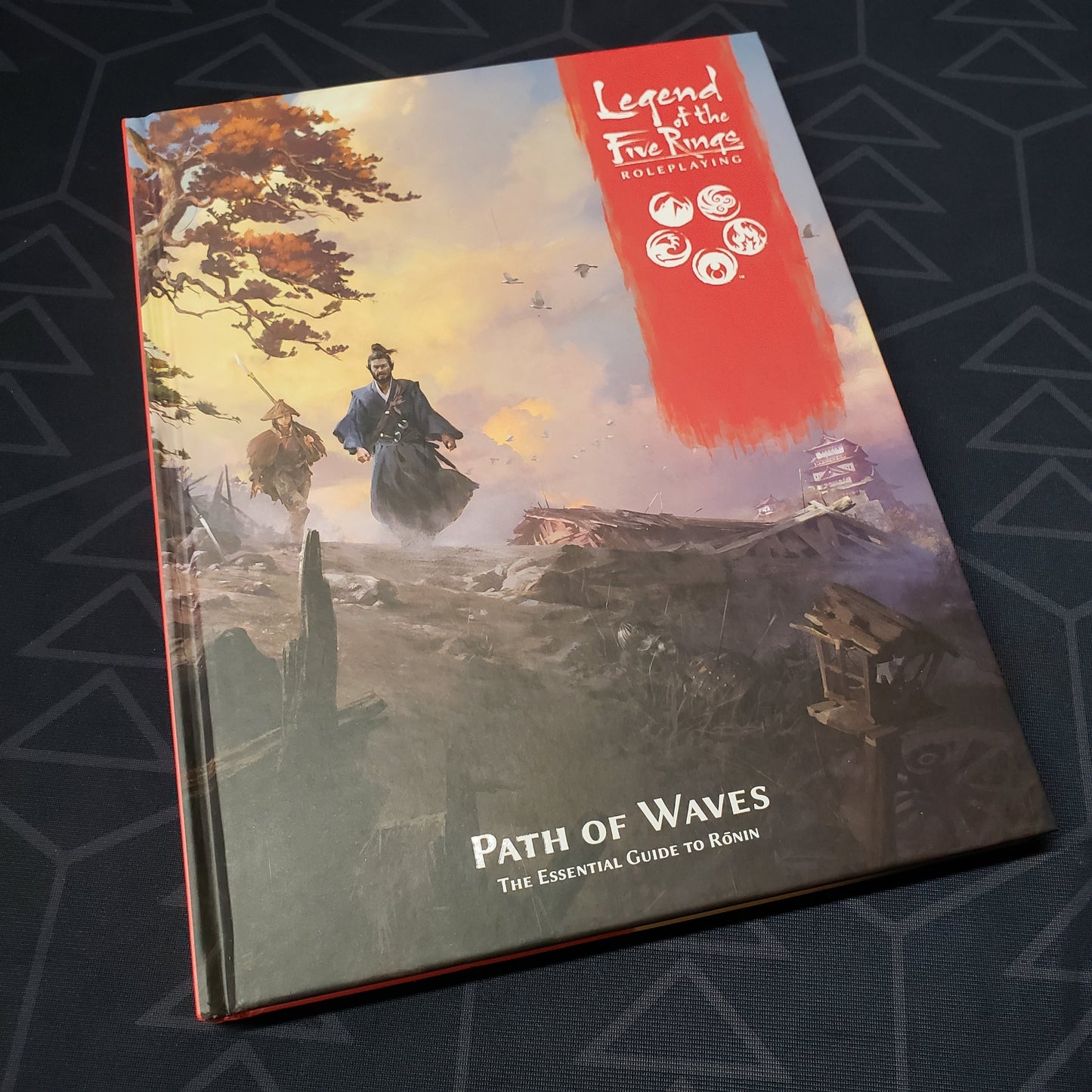 Image shows the front cover of the Path of Waves book for the roleplaying game Legend of the Five Rings: Fifth Edition