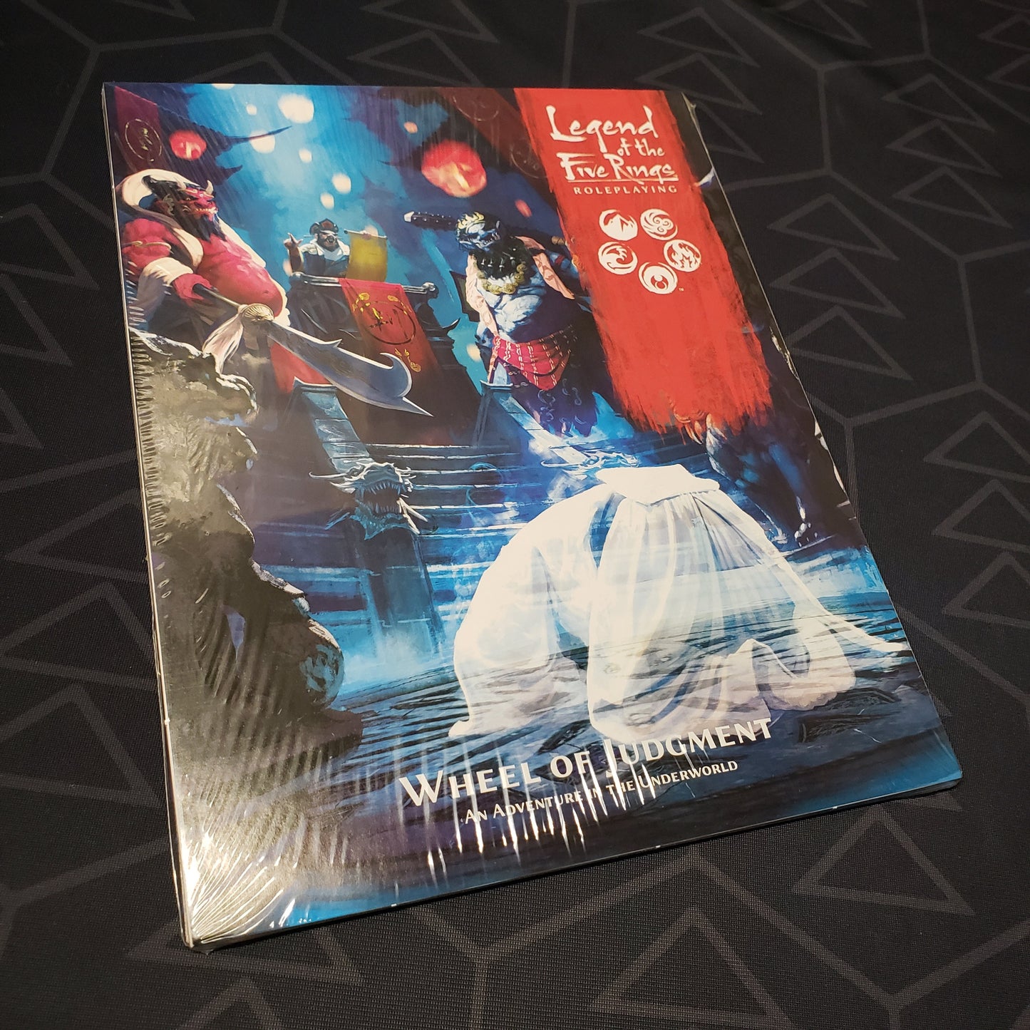 Image shows the front cover of the Wheel of Judgment book for the roleplaying game Legend of the Five Rings: Fifth Edition
