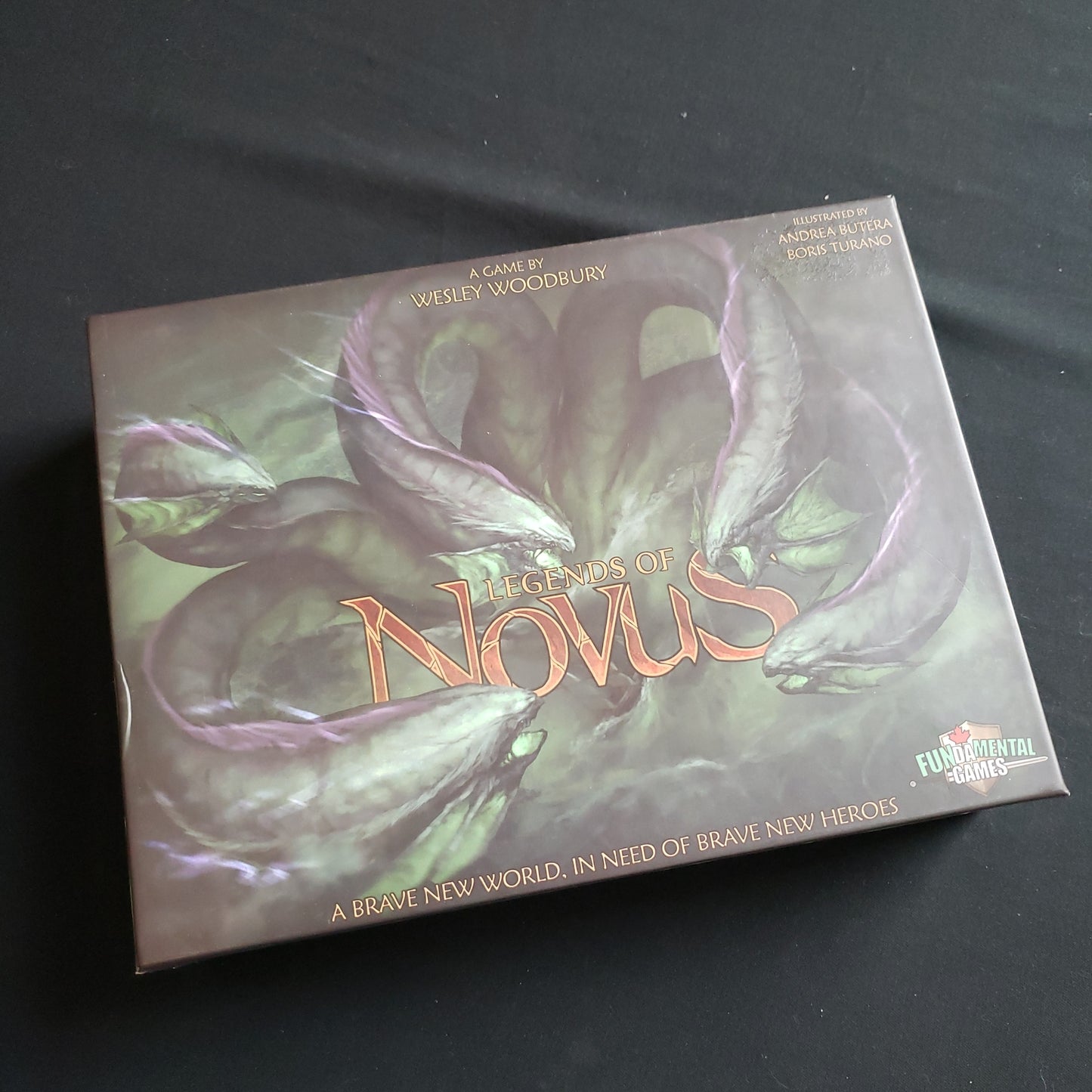 Image shows the front cover of the box of the Legends of Novus board game