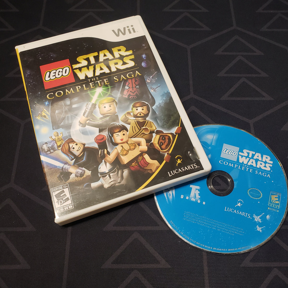 Image shows the case and disc for the video game LEGO Star Wars: The Complete Saga for Nintendo Wii