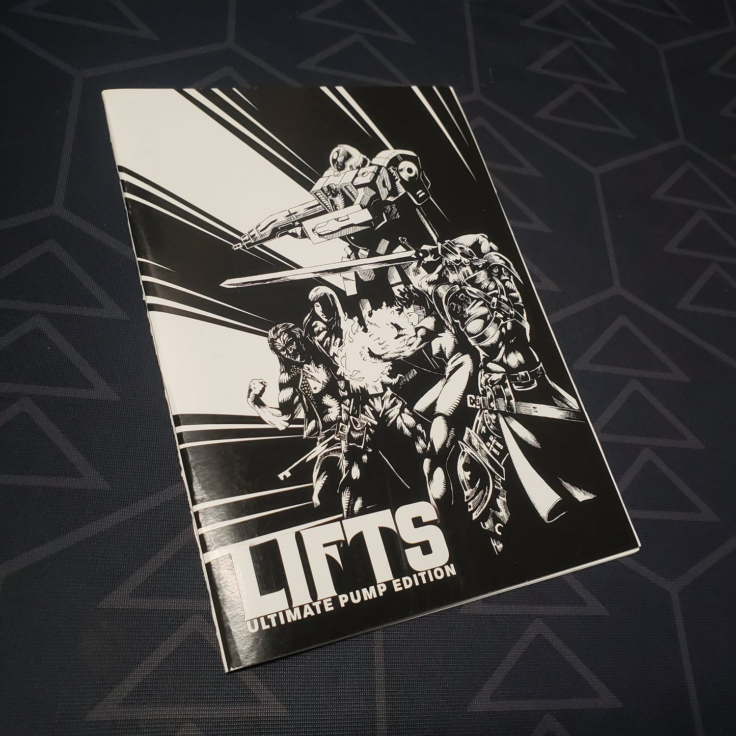 Image shows the front cover of the LIFTS: Ultimate Pump Edition roleplaying game zine book
