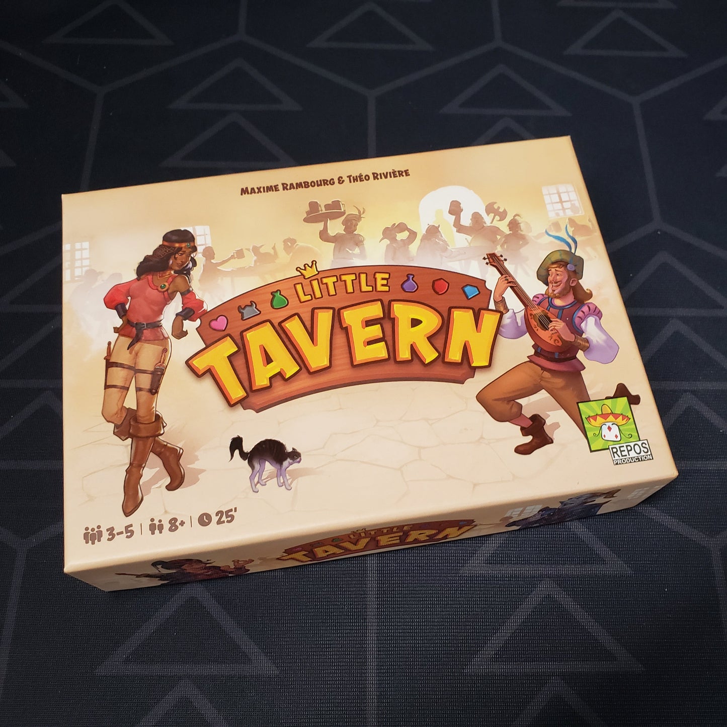 Image shows the front cover of the box of the Little Tavern card game