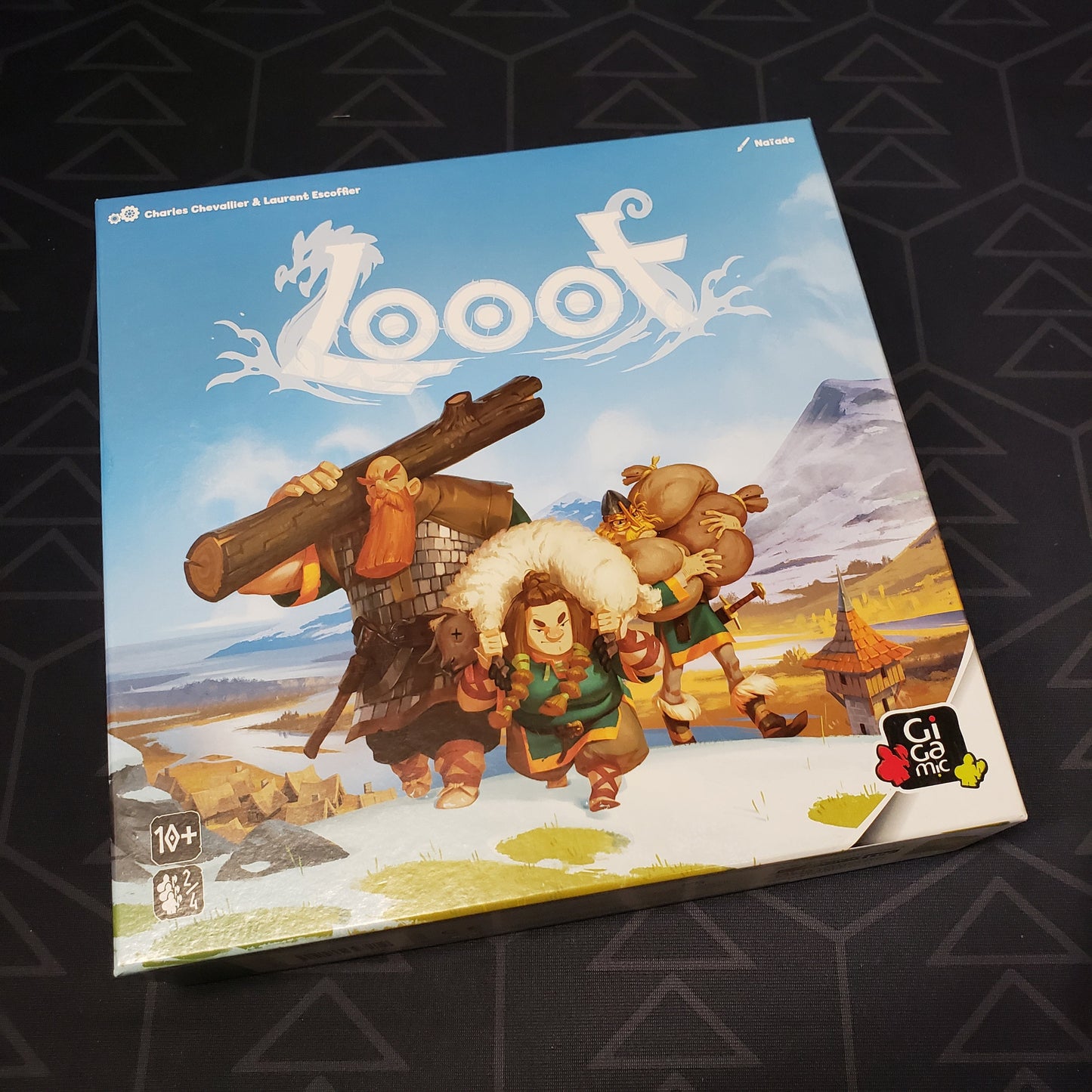 Image shows the front cover of the box for the Looot board game