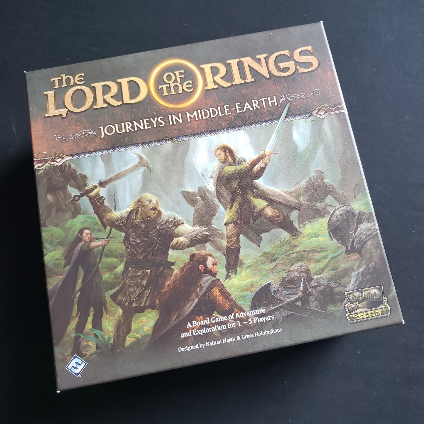 Image shows the front cover of the box of the Lord of the Rings: Journeys in Middle-Earth board game