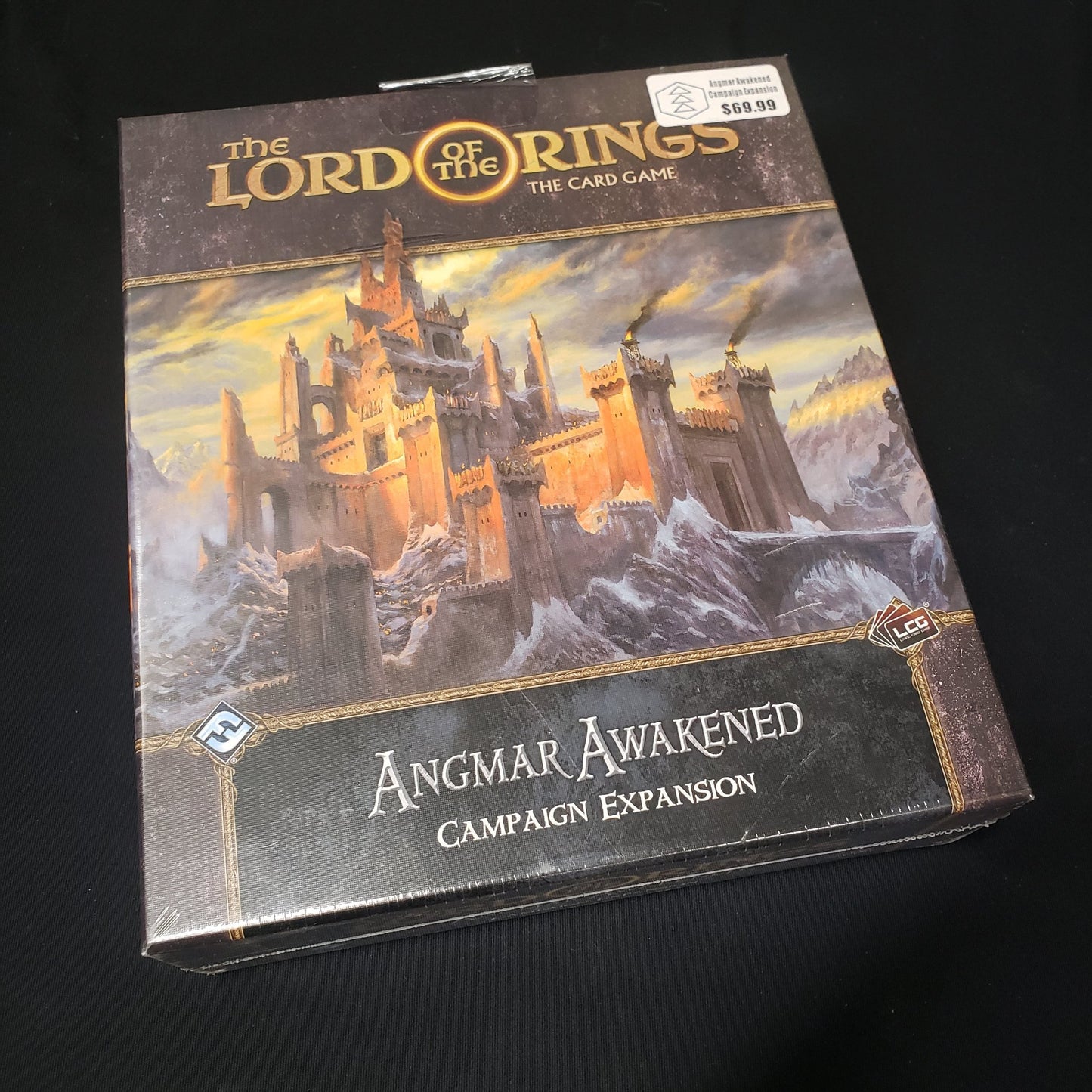 Image shows the front of the package for the Angmar Awakened Campaign Expansion for the Lord of the Rings card game