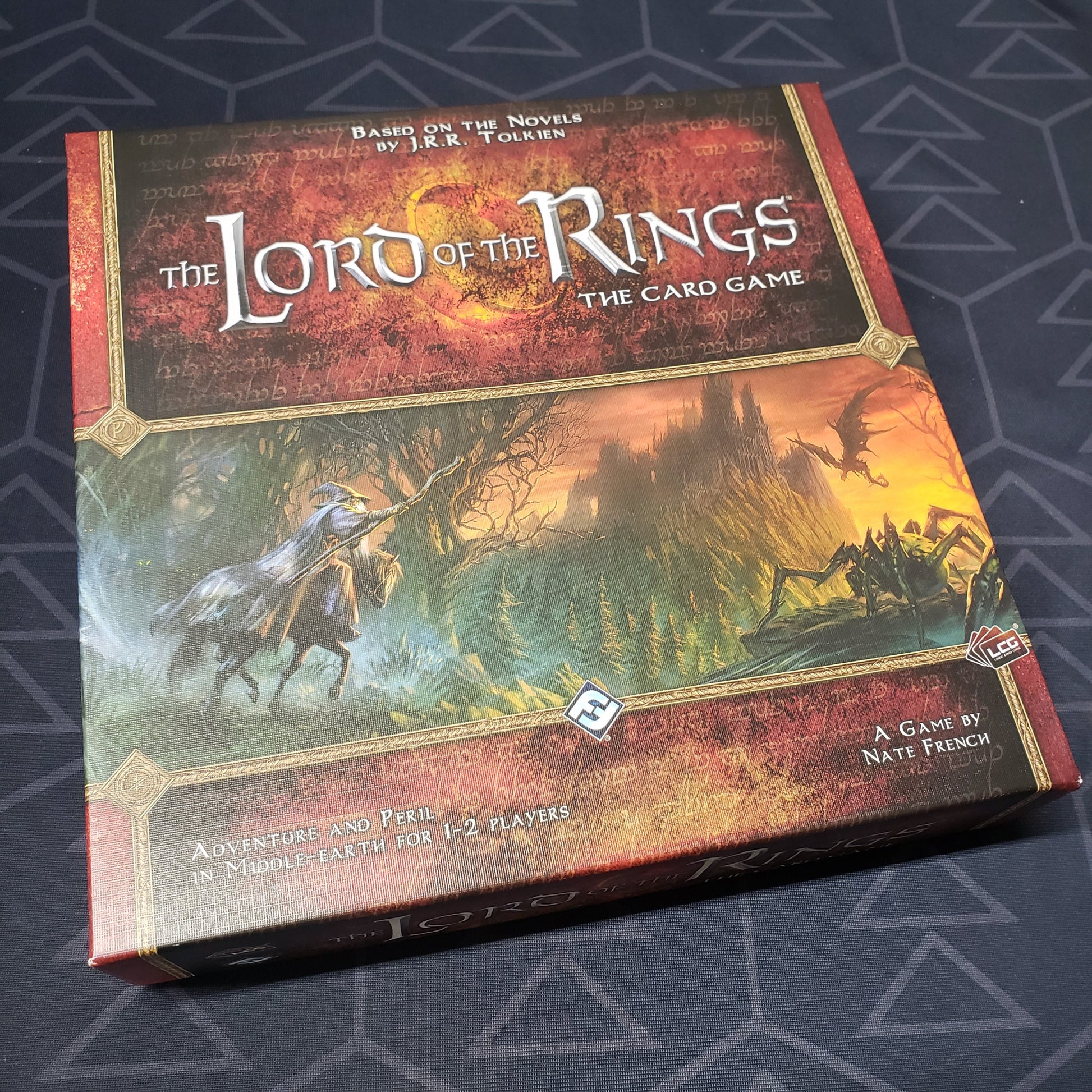 Image shows the front cover of the box of the Lord of the Rings: Card Game base set