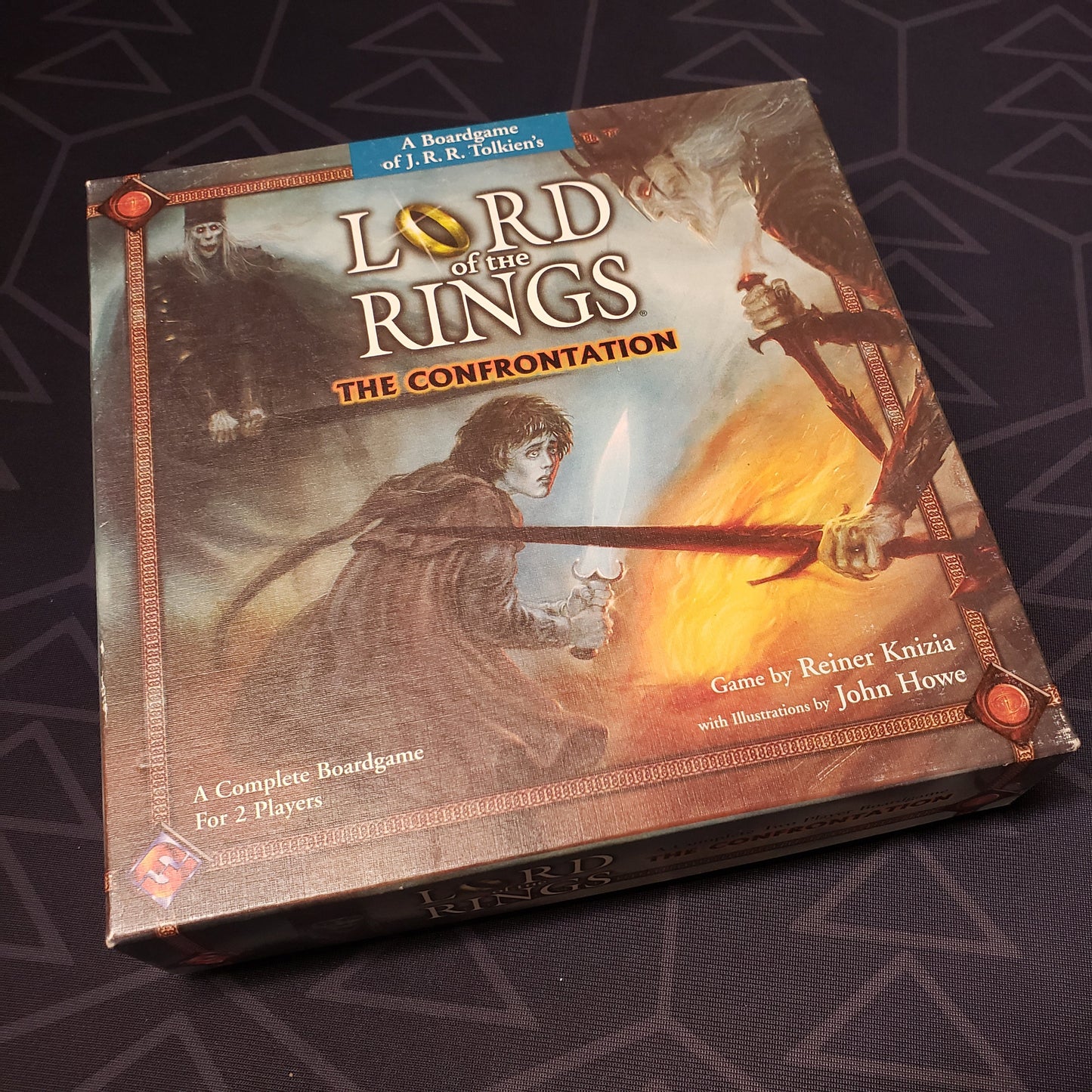 Image shows the front cover of the box of the board game Lord of the Rings: The Confrontation