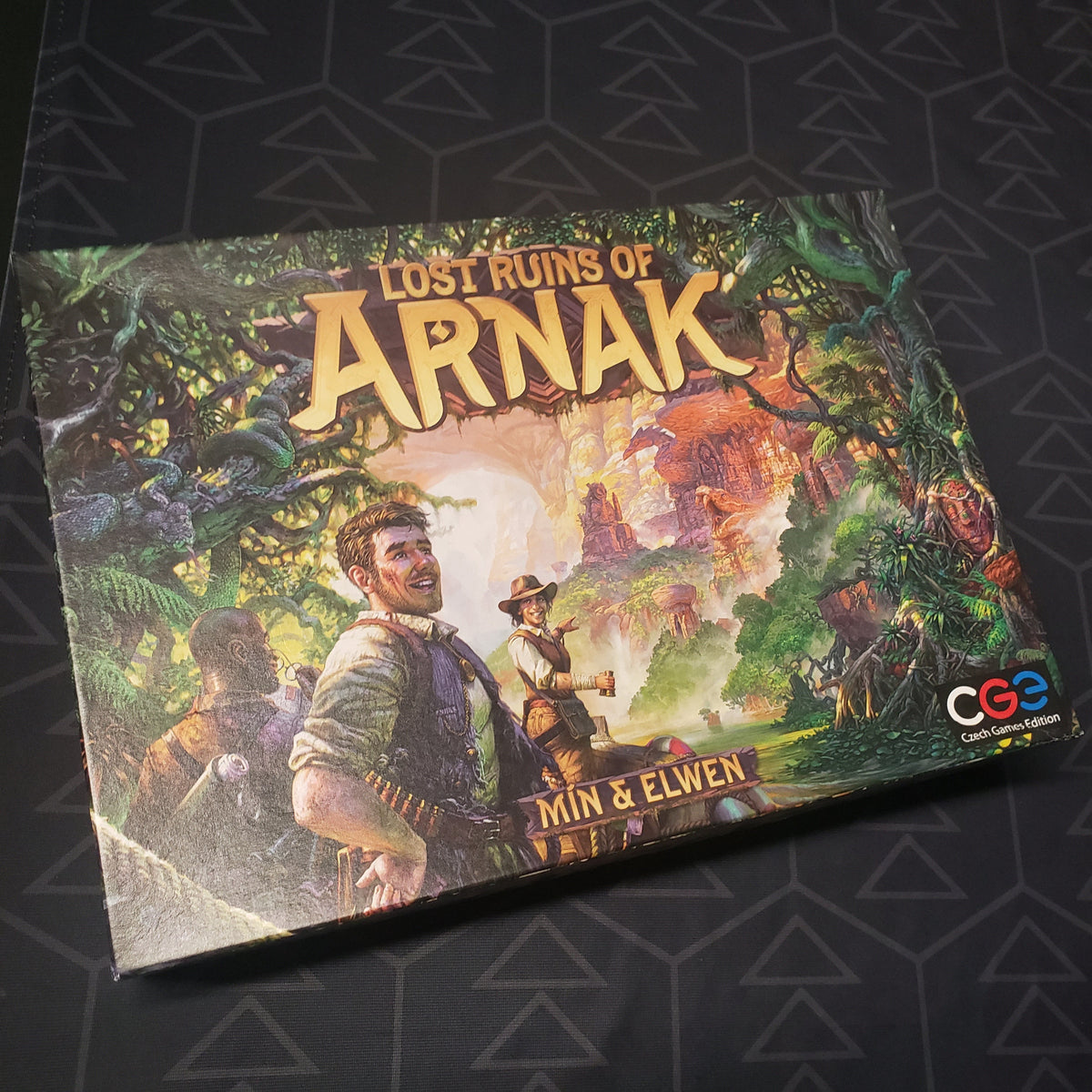 Image shows the front cover of the box of the Lost Ruins of Arnak board game