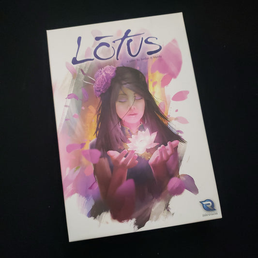 Image shows the front cover of the box of the Lotus card game