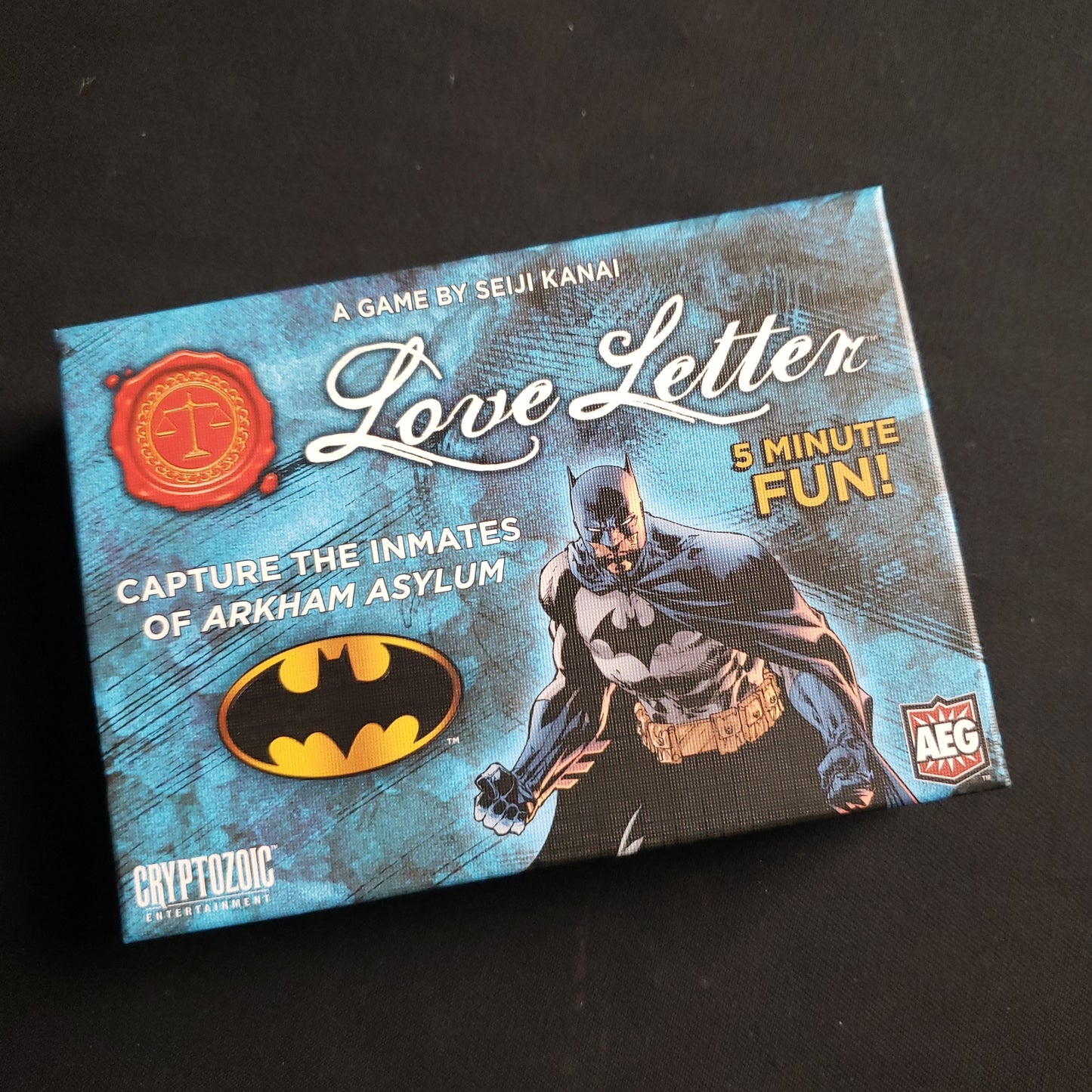 Image shows the front cover of the box of the Love Letter: Batman card game