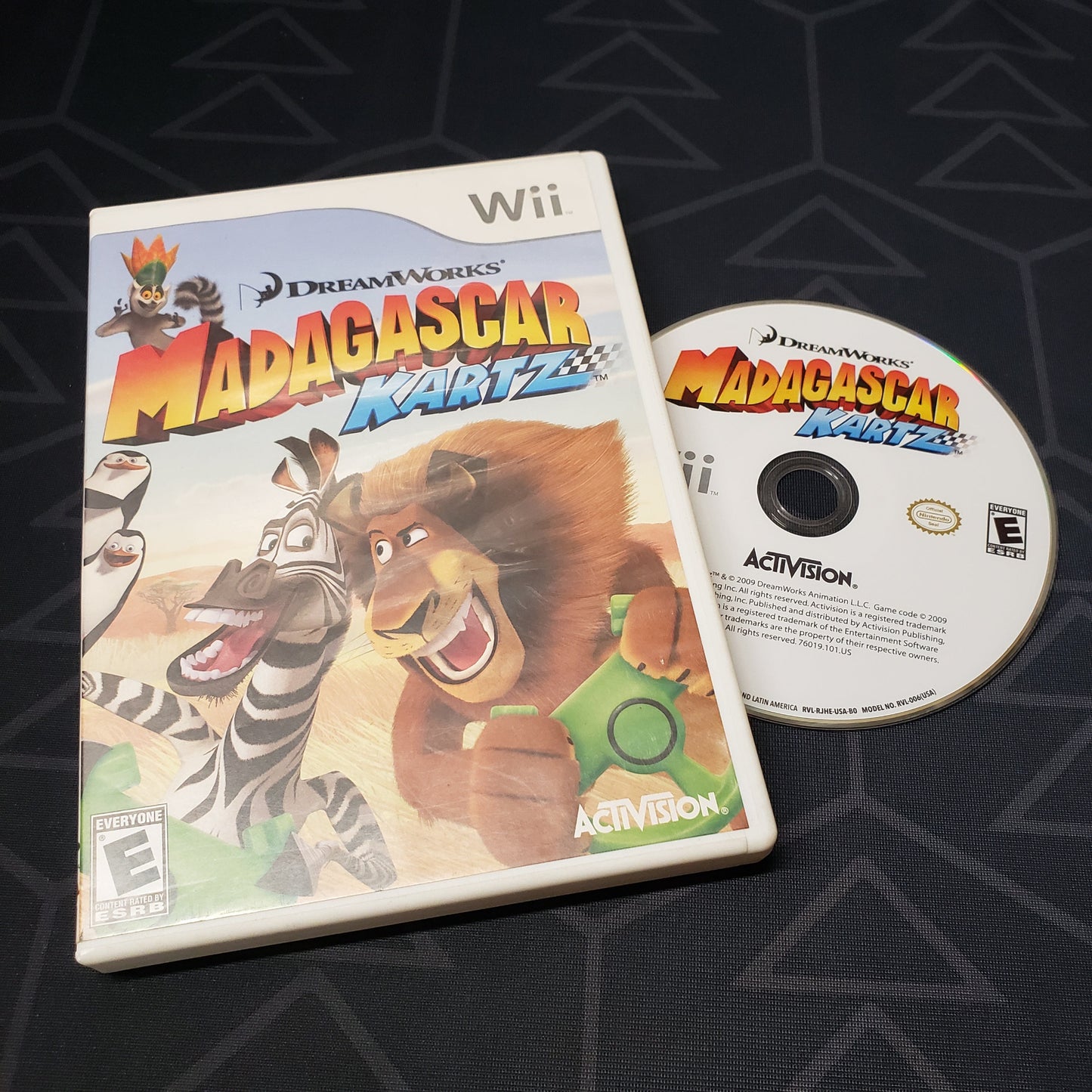 Image shows the case and disc for the video game Madagascar Kartz for Nintendo Wii